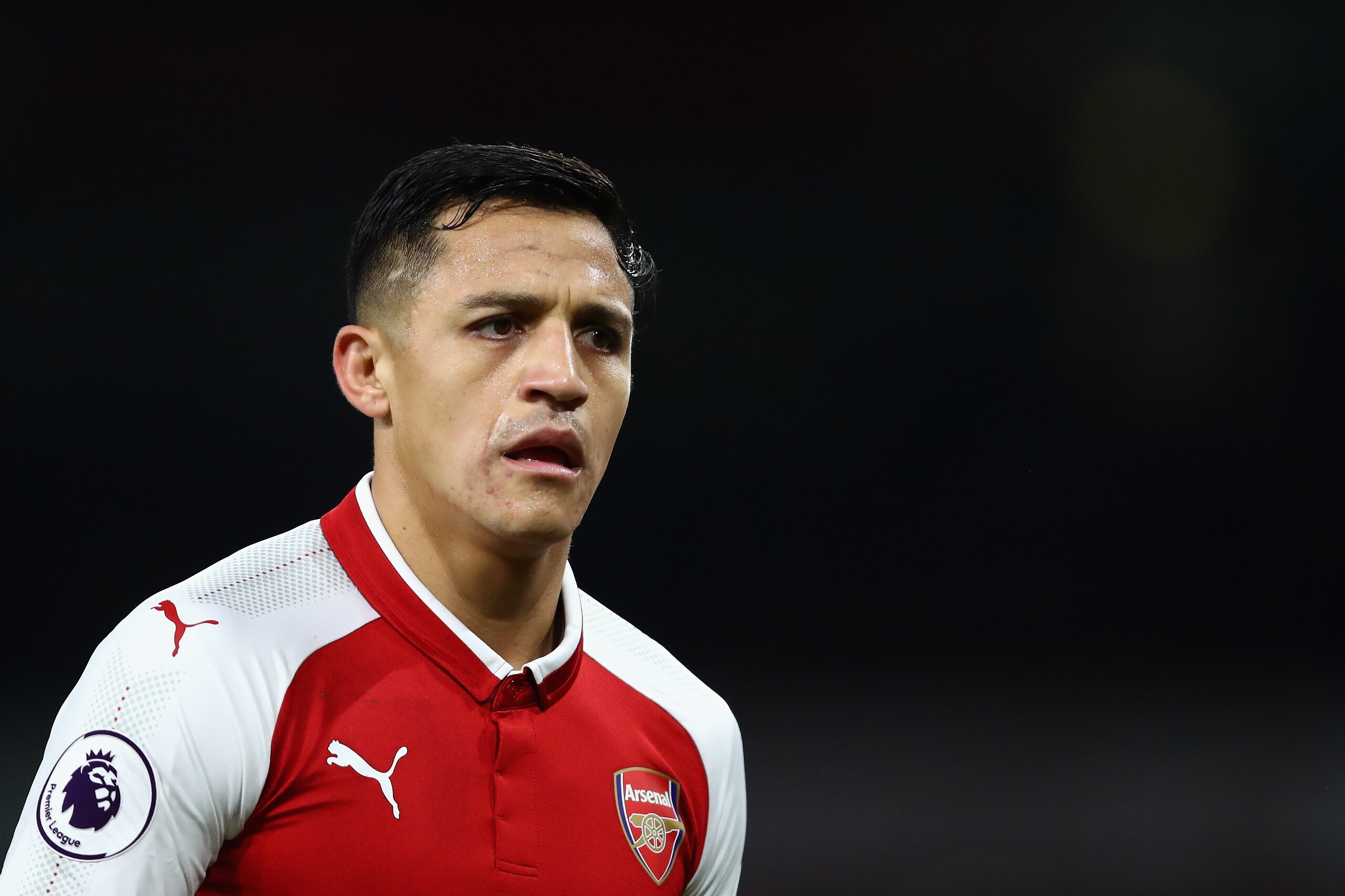 LONDON, ENGLAND - DECEMBER 22: Alexis Sanchez of Arsenal looks on during the Premier League match between Arsenal and Liverpool at Emirates Stadium on December 22, 2017 in London, England. (Photo by Julian Finney/Getty Images) LONDON, ENGLAND - DECEMBER 22: Alexis Sanchez of Arsenal looks on during the Premier League match between Arsenal and Liverpool at Emirates Stadium on December 22, 2017 in London, England. (Photo by Julian Finney/Getty Images)