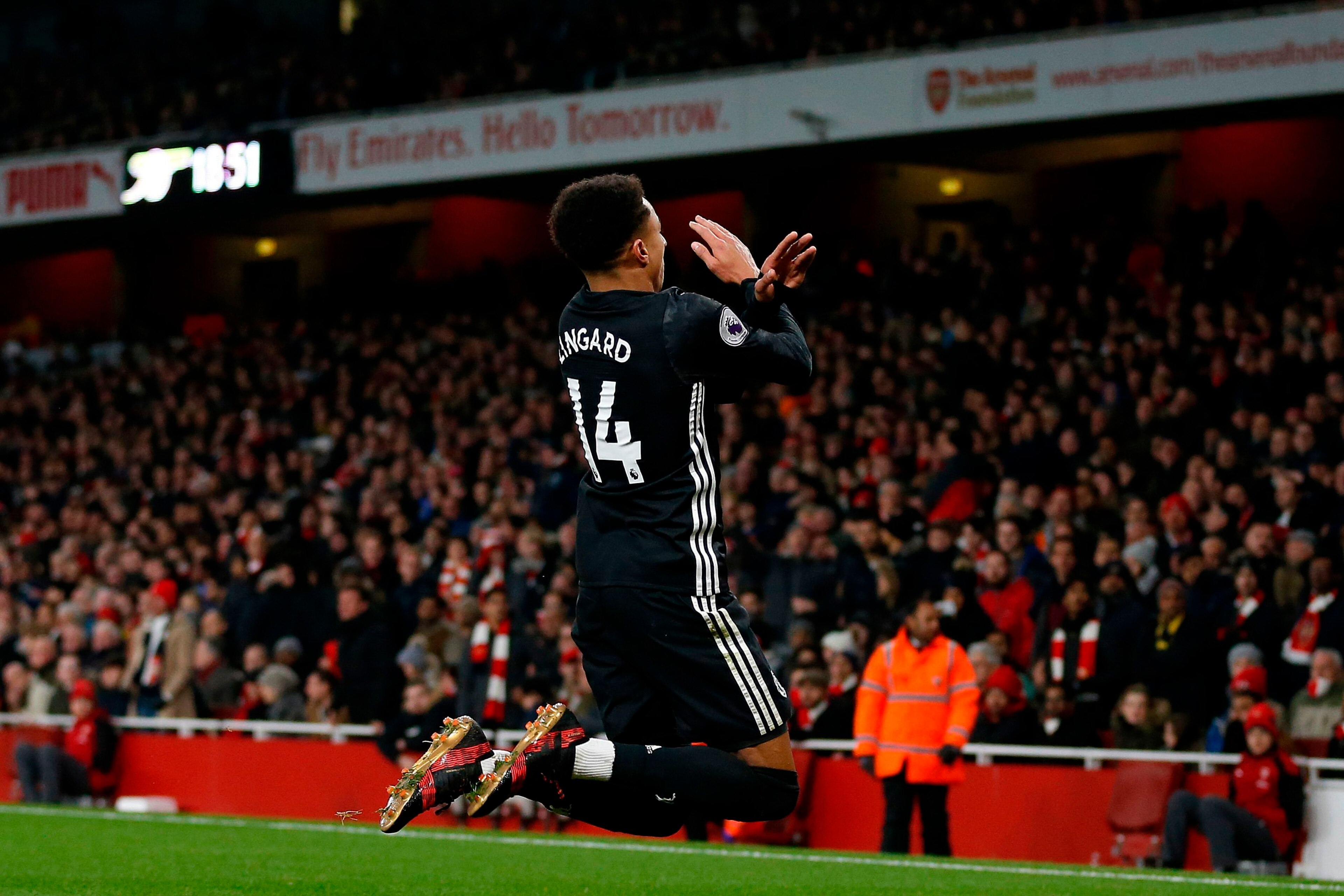 Manchester United's English midfielder Jesse Lingard celebrates scoring his team's third goal during the English Premier League football match between Arsenal and Manchester United at the Emirates Stadium in London on December 2, 2017. / AFP PHOTO / IKI Manchester United's English midfielder Jesse Lingard celebrates scoring his team's third goal during the English Premier League football match between Arsenal and Manchester United at the Emirates Stadium in London on December 2, 2017. / AFP PHOTO / IKI