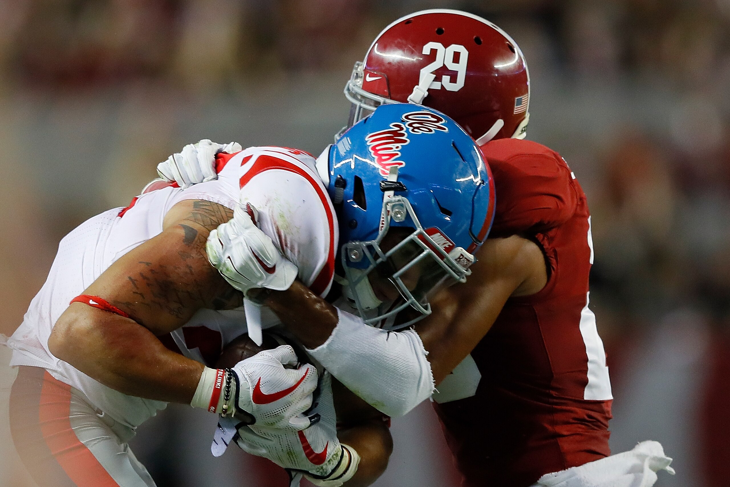 TUSCALOOSA, AL - SEPTEMBER 30:  Minkah Fitzpatrick #29 of the Alabama Crimson Tide tackles Jordan Wilkins #22 of the Mississippi Rebels at Bryant-Denny Stadium on September 30, 2017 in Tuscaloosa, Alabama.  (Photo by Kevin C. Cox/Getty Images)