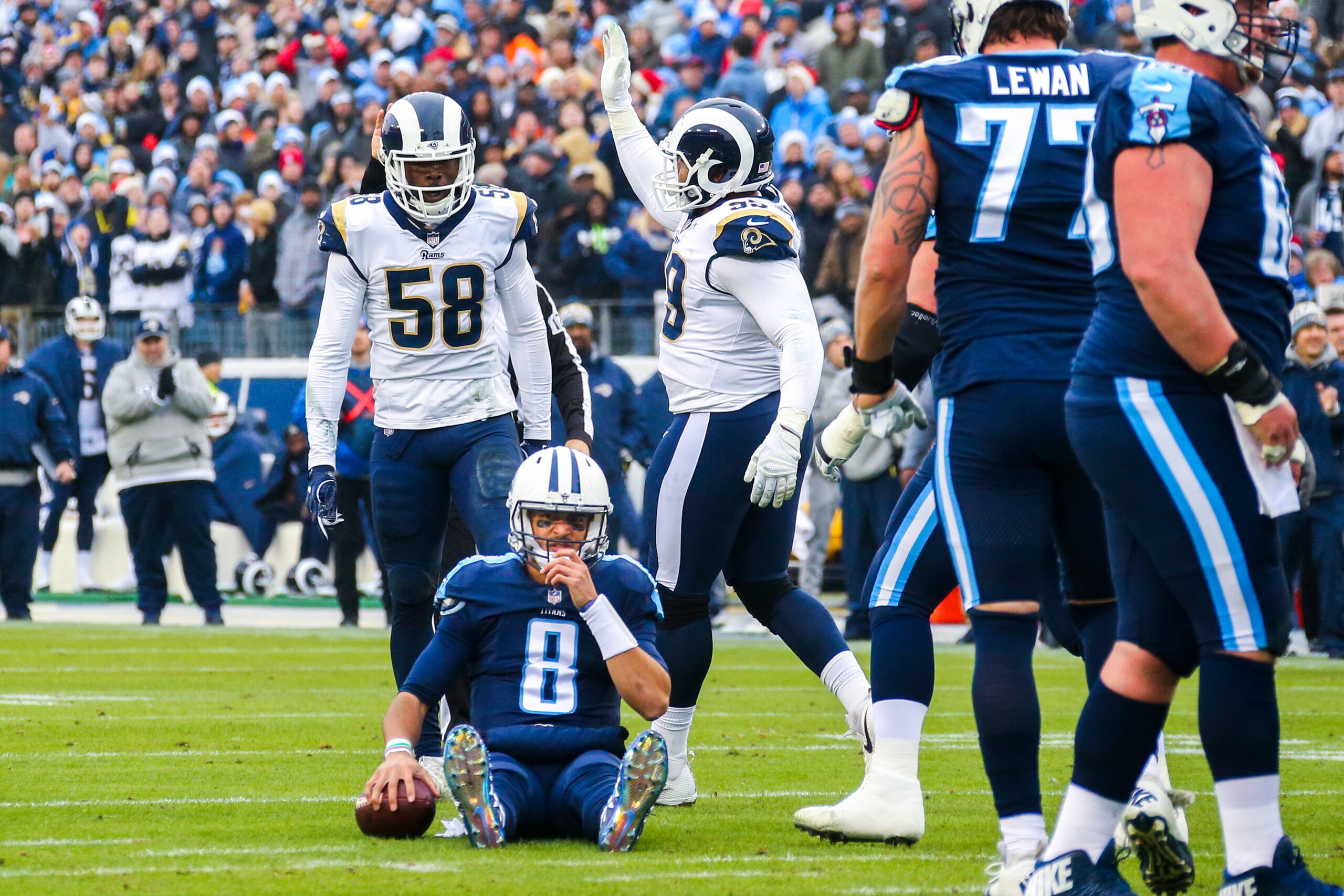 NASHVILLE, TN - DECEMBER 24: Outside Linebacker Cory Littleton #58 of the Los Angeles Rams reacts after sacking Quarterback Marcus Mariota #8 of the Tennessee Titans at Nissan Stadium on December 24, 2017 in Nashville, Tennessee. (Photo by Frederick Bre NASHVILLE, TN - DECEMBER 24: Outside Linebacker Cory Littleton #58 of the Los Angeles Rams reacts after sacking Quarterback Marcus Mariota #8 of the Tennessee Titans at Nissan Stadium on December 24, 2017 in Nashville, Tennessee. (Photo by Frederick Bre
