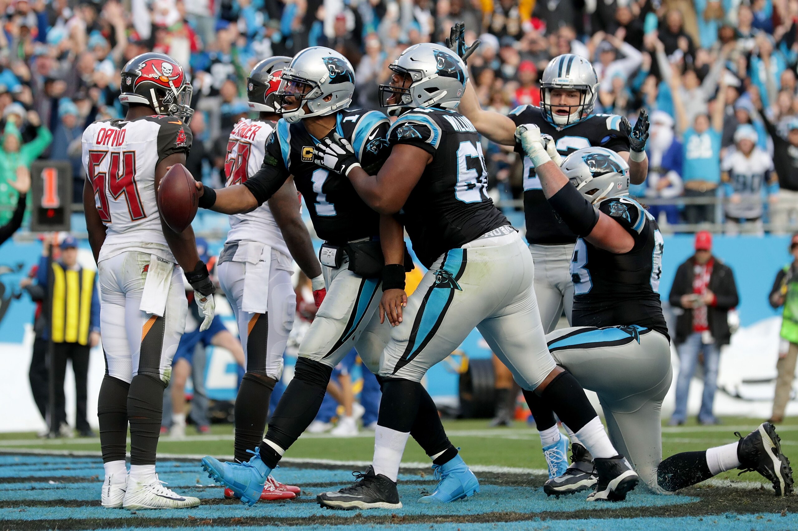 CHARLOTTE, NC - DECEMBER 24: Cam Newton #1 of the Carolina Panthers reacts after scoring the game winning touchdown against the Tampa Bay Buccaneers in the fourth quarter during their game at Bank of America Stadium on December 24, 2017 in Charlotte, Nor CHARLOTTE, NC - DECEMBER 24: Cam Newton #1 of the Carolina Panthers reacts after scoring the game winning touchdown against the Tampa Bay Buccaneers in the fourth quarter during their game at Bank of America Stadium on December 24, 2017 in Charlotte, Nor