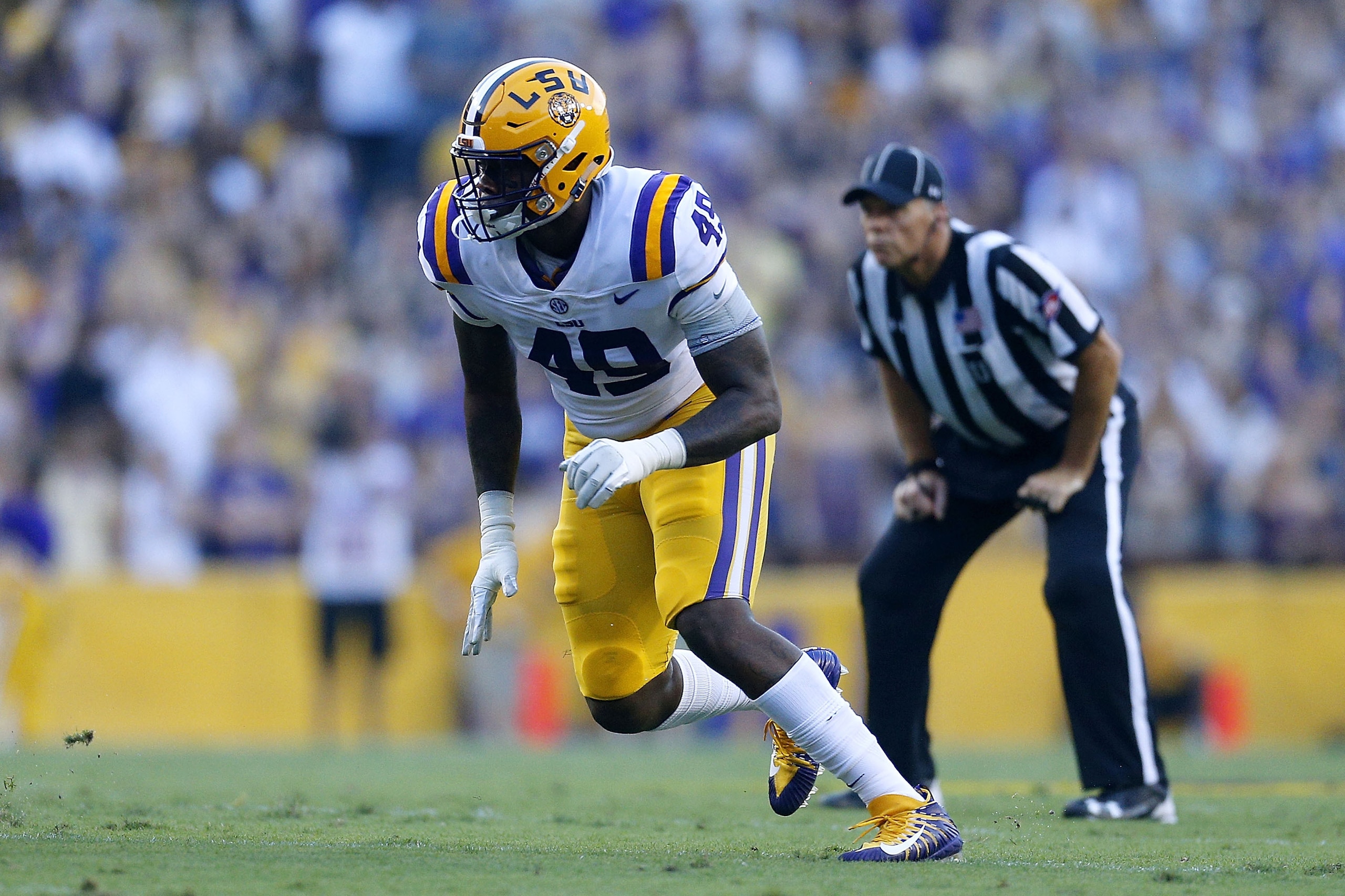 BATON ROUGE, LA - SEPTEMBER 23:  Arden Key #49 of the LSU Tigers rushes during a game against the Syracuse Orange at Tiger Stadium on September 23, 2017 in Baton Rouge, Louisiana.  (Photo by Jonathan Bachman/Getty Images)