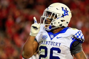 ATHENS, GA - NOVEMBER 18: Benny Snell Jr. #26 of the Kentucky Wildcats celebrates a touchdown during the second half against the Georgia Bulldogs at Sanford Stadium on November 18, 2017 in Athens, Georgia. (Photo by Daniel Shirey/Getty Images)