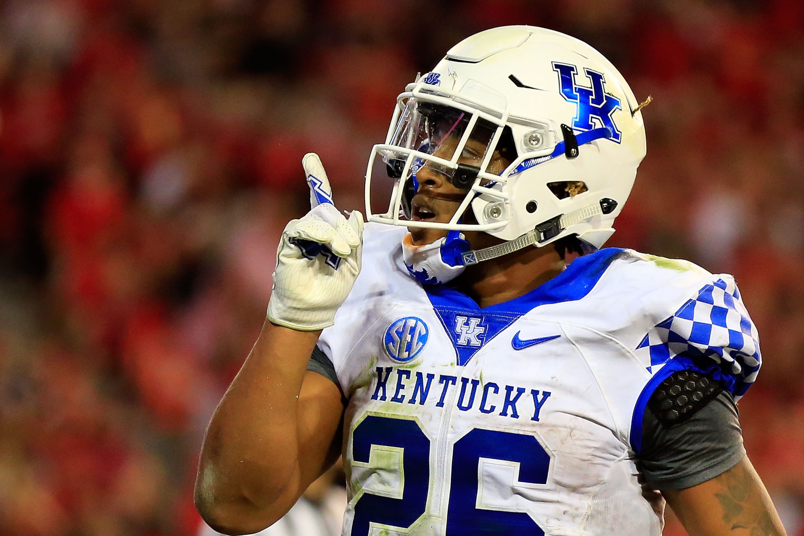 ATHENS, GA - NOVEMBER 18: Benny Snell Jr. #26 of the Kentucky Wildcats celebrates a touchdown during the second half against the Georgia Bulldogs at Sanford Stadium on November 18, 2017 in Athens, Georgia. (Photo by Daniel Shirey/Getty Images)