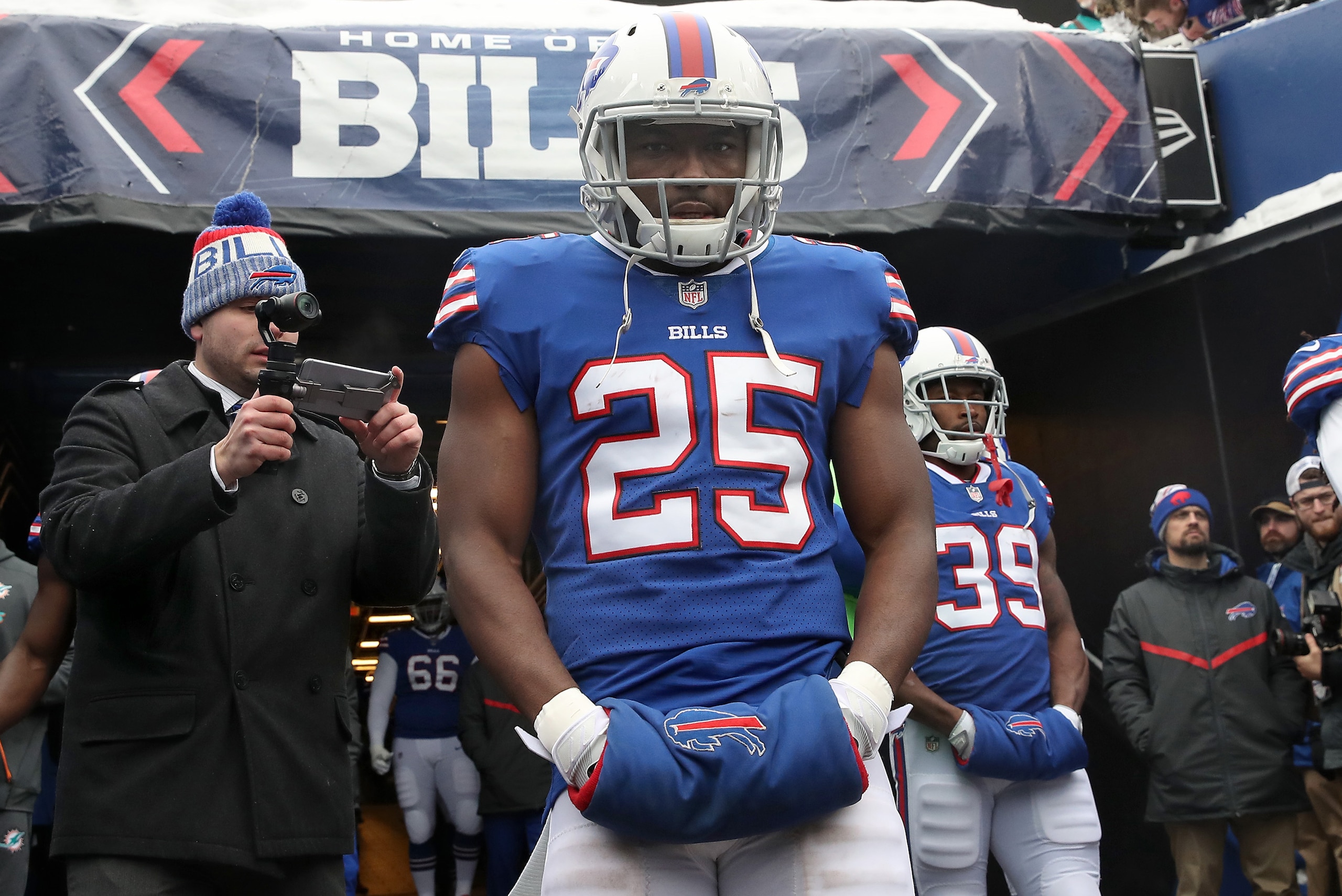 BUFFALO, NY - DECEMBER 17: LeSean McCoy #25 of the Buffalo Bills walks out onto the field through the tunnel before the start of NFL game action against the Miami Dolphins at New Era Field on December 17, 2017 in Buffalo, New York. (Photo by Tom Szczerbow