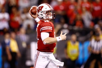INDIANAPOLIS, IN - DECEMBER 02:  Alex Hornibrook #12 of the Wisconsin Badgers throws a pass against the Ohio State Buckeyes in the Big Ten Championship at Lucas Oil Stadium on December 2, 2017 in Indianapolis, Indiana.  (Photo by Andy Lyons/Getty Images)