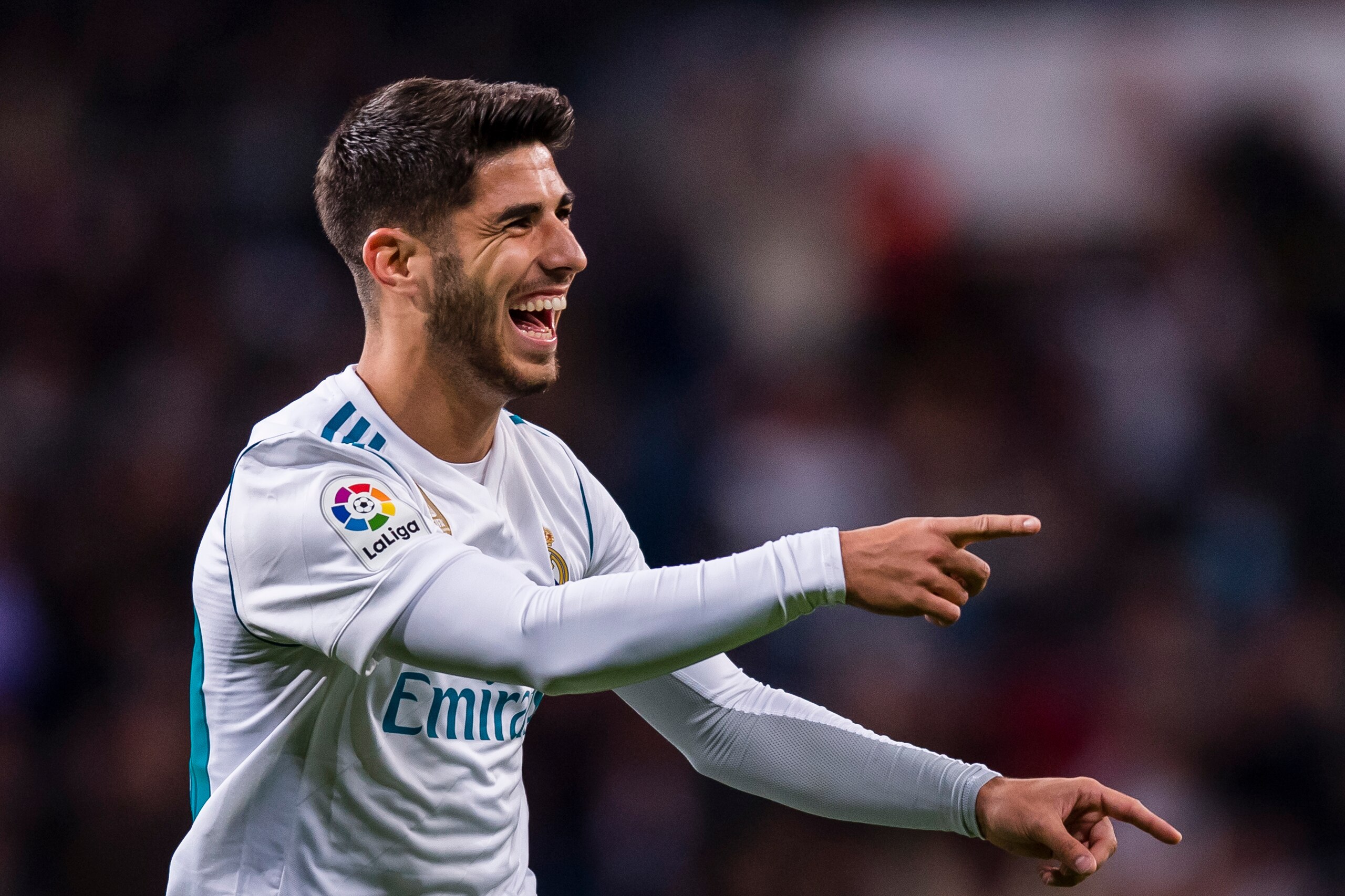 MADRID, SPAIN - NOVEMBER 05: Marco Asensio Willemsen of Real Madrid celebrates after scoring his goal  during the La Liga 2017-18 match between Real Madrid and UD Las Palmas at Estadio Santiago Bernabeu on November 05 2017 in Madrid, Spain. (Photo by Powe