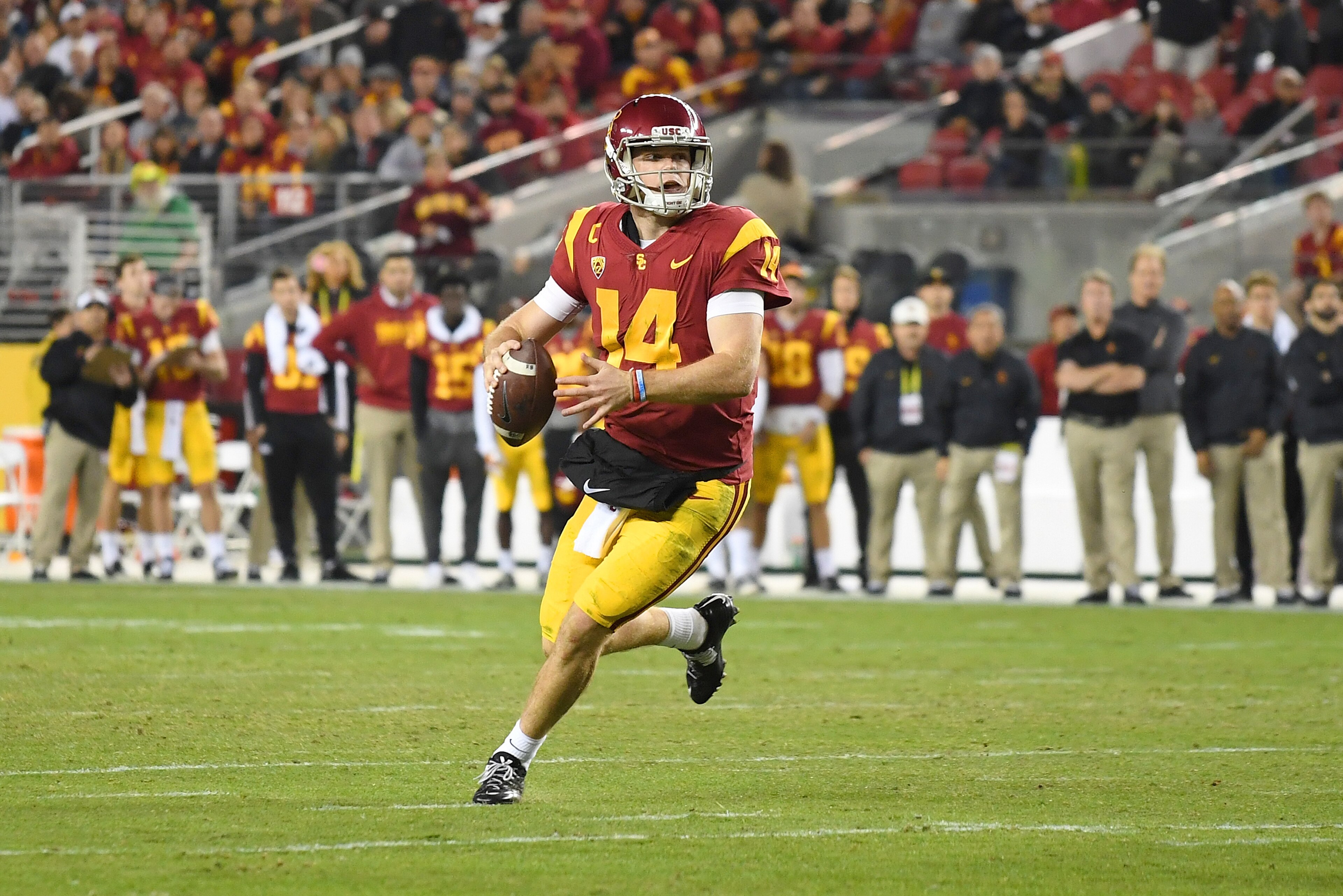 SANTA CLARA, CA - DECEMBER 01:  Sam Darnold #14 of the USC Trojans looks to throw a pass against the Stanford Cardinal during the Pac-12 Football Championship Game at Levi's Stadium on December 1, 2017 in Santa Clara, California.  (Photo by Thearon W. Hen