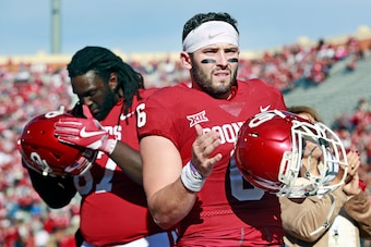 NORMAN, OK - NOVEMBER 25: Quarterback Baker Mayfield #6 of the Oklahoma Sooners claps during Senior Day announcements before the game against the West Virginia Mountaineers at Gaylord Family Oklahoma Memorial Stadium on November 25, 2017 in Norman, Oklaho