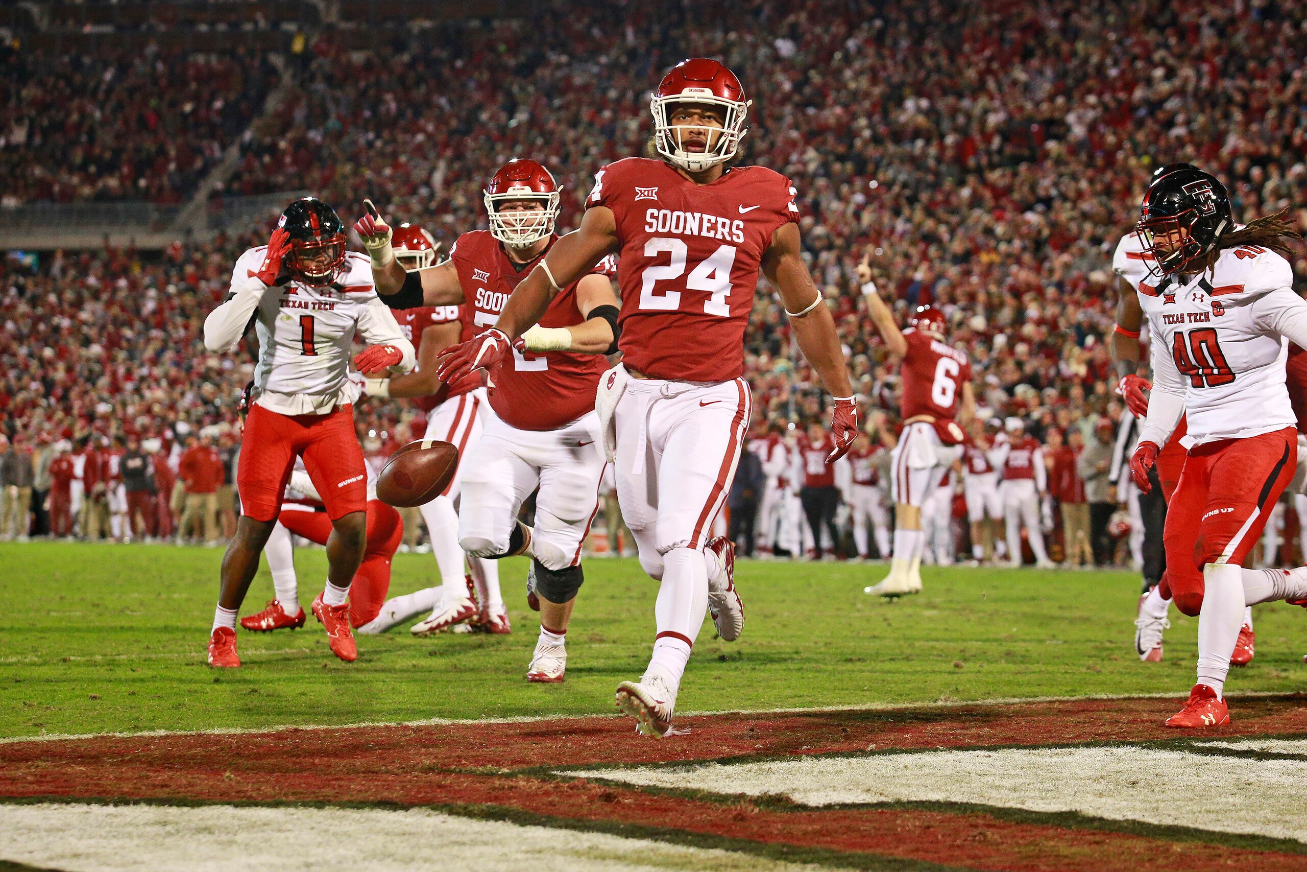 NORMAN, OK - OCTOBER 28: Running back Rodney Anderson #24 of the Oklahoma Sooners scores against the Texas Tech Red Raiders at Gaylord Family Oklahoma Memorial Stadium on October 28, 2017 in Norman, Oklahoma. (Photo by Brett Deering/Getty Images)
