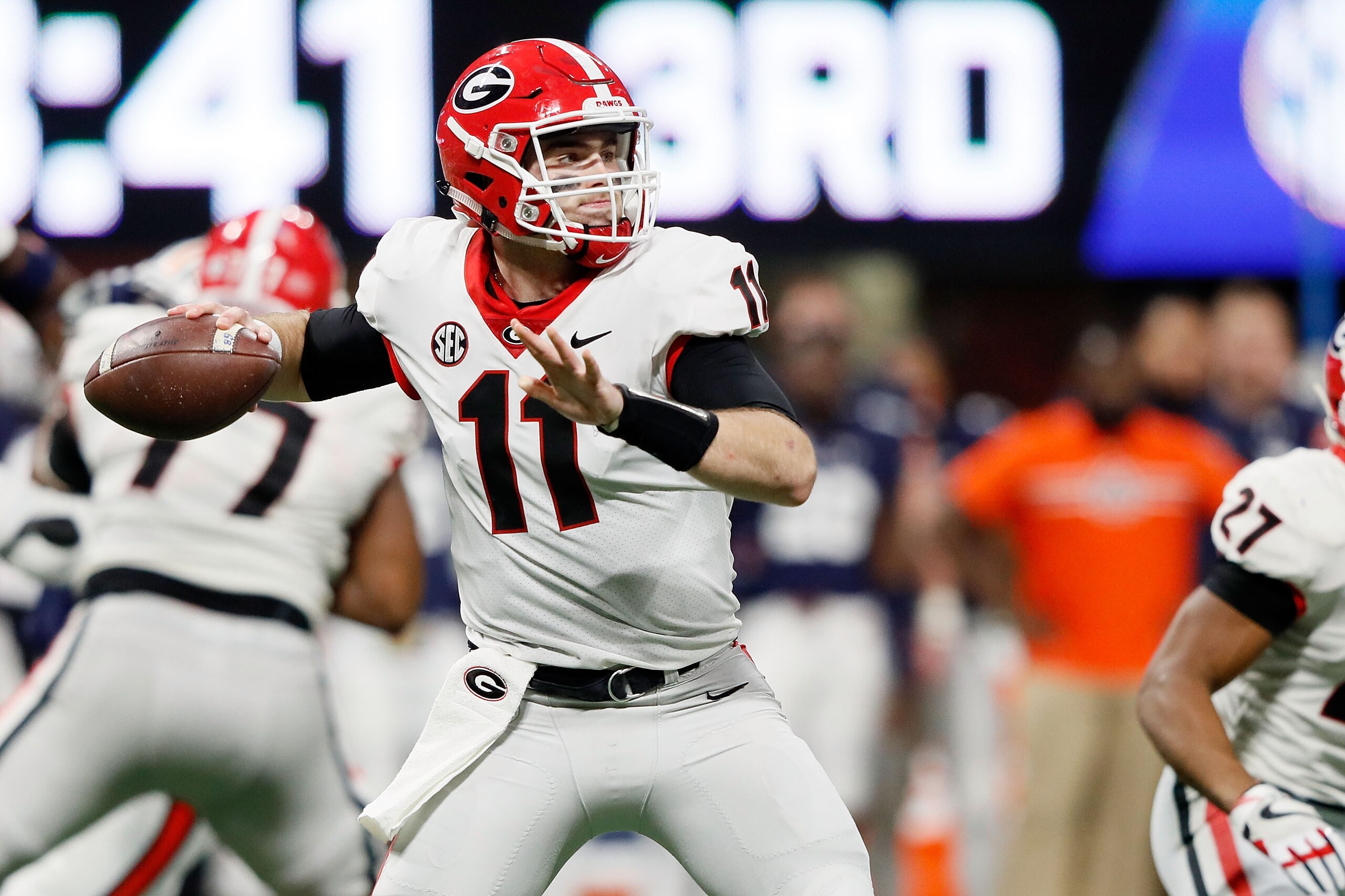ATLANTA, GA - DECEMBER 02: Jake Fromm #11 of the Georgia Bulldogs throws a pass during the second half against the Auburn Tigers in the SEC Championship at Mercedes-Benz Stadium on December 2, 2017 in Atlanta, Georgia. (Photo by Jamie Squire/Getty Images)