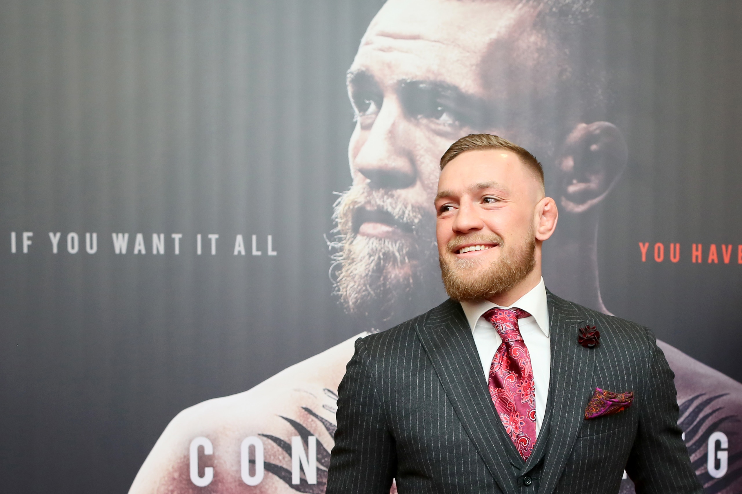 Irish mixed martial arts star Conor McGregor poses upon arrival to attend the world premiere of the documentary film 'Conor McGregor: Notorious' at the Savoy Cinema in Dublin, Ireland on November 1, 2017. / AFP PHOTO / Paul FAITH        (Photo credit shou