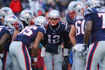 FOXBORO, MA - DECEMBER 31:  Tom Brady #12 of the New England Patriots huddles with teammates during the second half against the New York Jets at Gillette Stadium on December 31, 2017 in Foxboro, Massachusetts.  (Photo by Maddie Meyer/Getty Images)