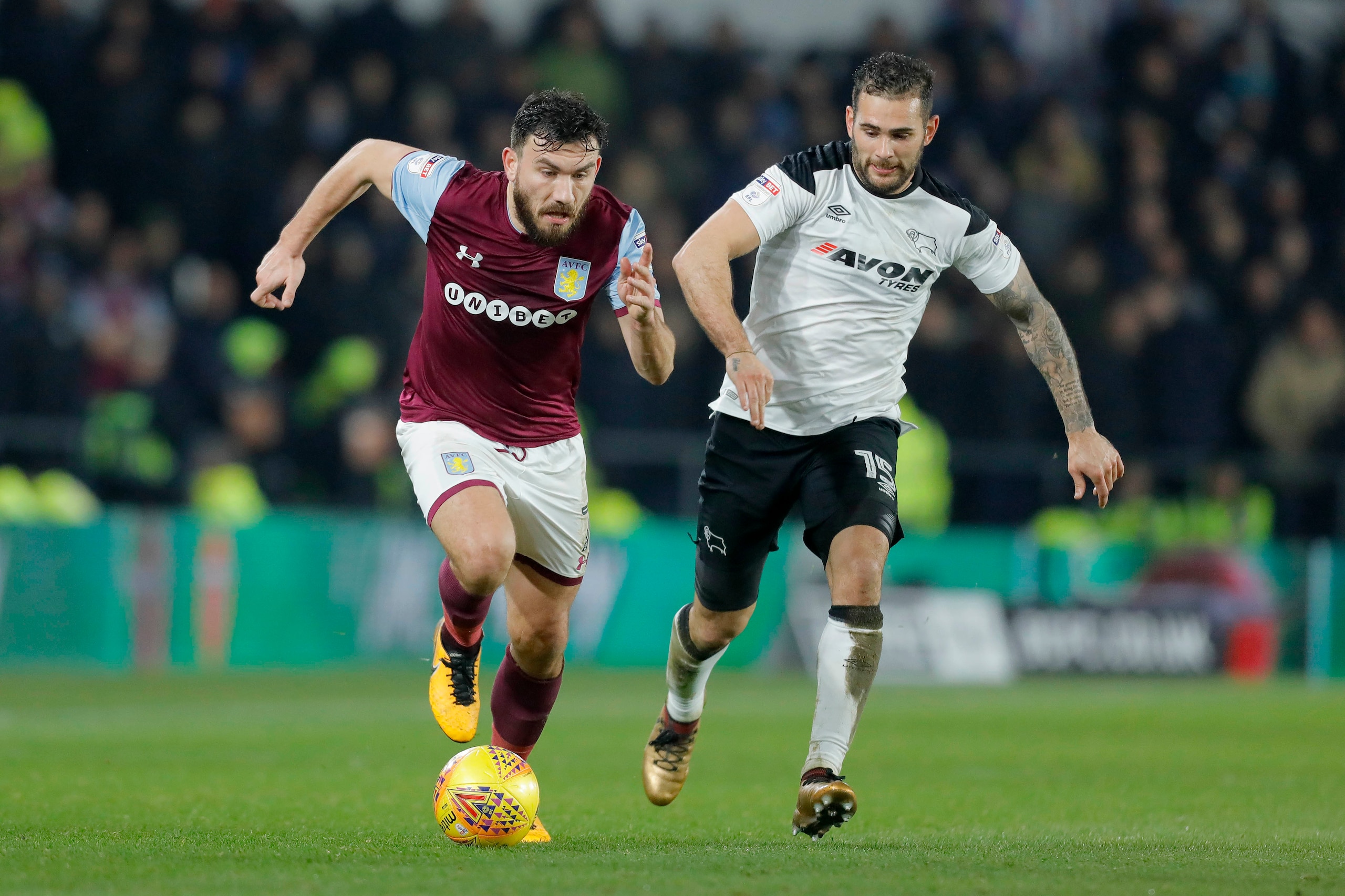 DERBY, ENGLAND - DECEMBER 16:  Robert Snodgrass of Aston Villa competes with Bradley Johnson of Derby County during the Sky Bet Championship match between Derby County and Aston Villa at iPro Stadium on December 16, 2017 in Derby, England. (Photo by Malco
