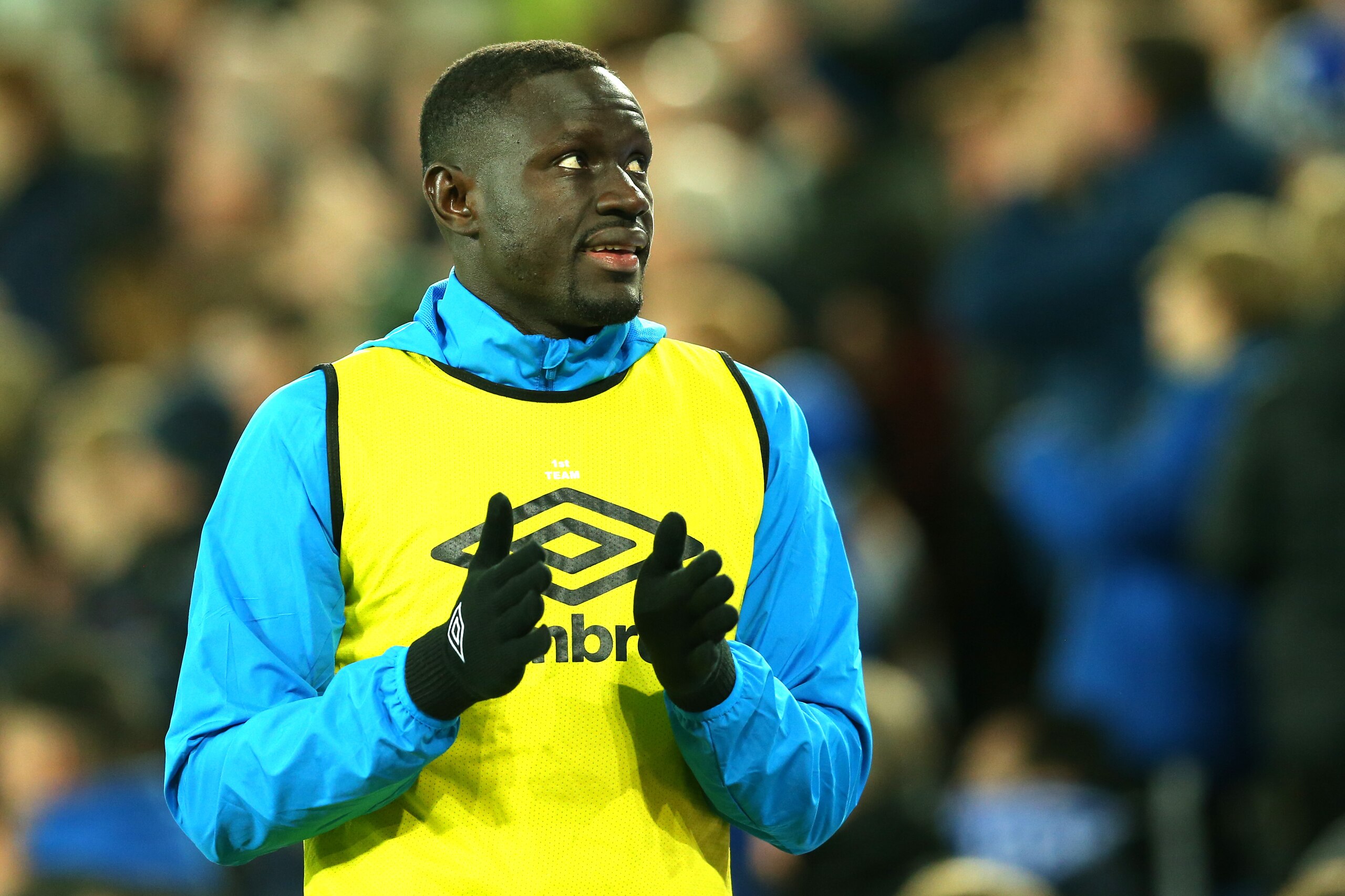 LIVERPOOL, ENGLAND - DECEMBER 02: Oumar Niasse of Everton shows appreciation to the fans as he warms up during the Premier League match between Everton and Huddersfield Town at Goodison Park on December 2, 2017 in Liverpool, England.  (Photo by Jan Kruger