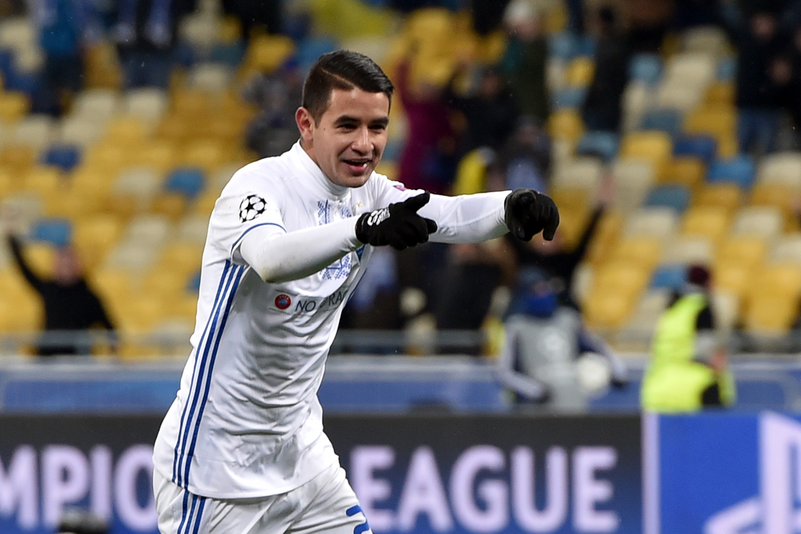 FC Dynamo Kiev 's Derlis Gonzalez  celebrates after scoring a goal during the Champions League football match between FC Dynamo and Besiktas JK on December 6, 2016 at the Olympiyski Stadium in Kiev. / AFP / SERGEI SUPINSKY        (Photo credit should read