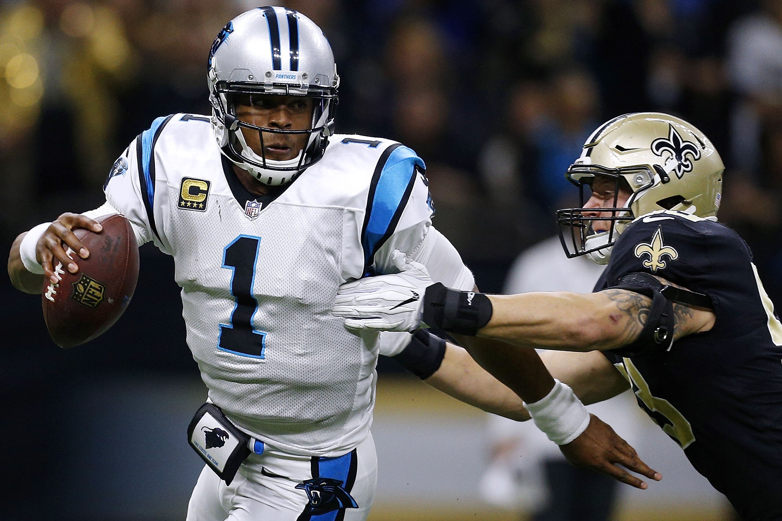 NEW ORLEANS, LA - DECEMBER 03: Cam Newton #1 of the Carolina Panthers is sacked by A.J. Klein #53 of the New Orleans Saints during the second half of a game at the Mercedes-Benz Superdome on December 3, 2017 in New Orleans, Louisiana. (Photo by Jonathan NEW ORLEANS, LA - DECEMBER 03: Cam Newton #1 of the Carolina Panthers is sacked by A.J. Klein #53 of the New Orleans Saints during the second half of a game at the Mercedes-Benz Superdome on December 3, 2017 in New Orleans, Louisiana. (Photo by Jonathan