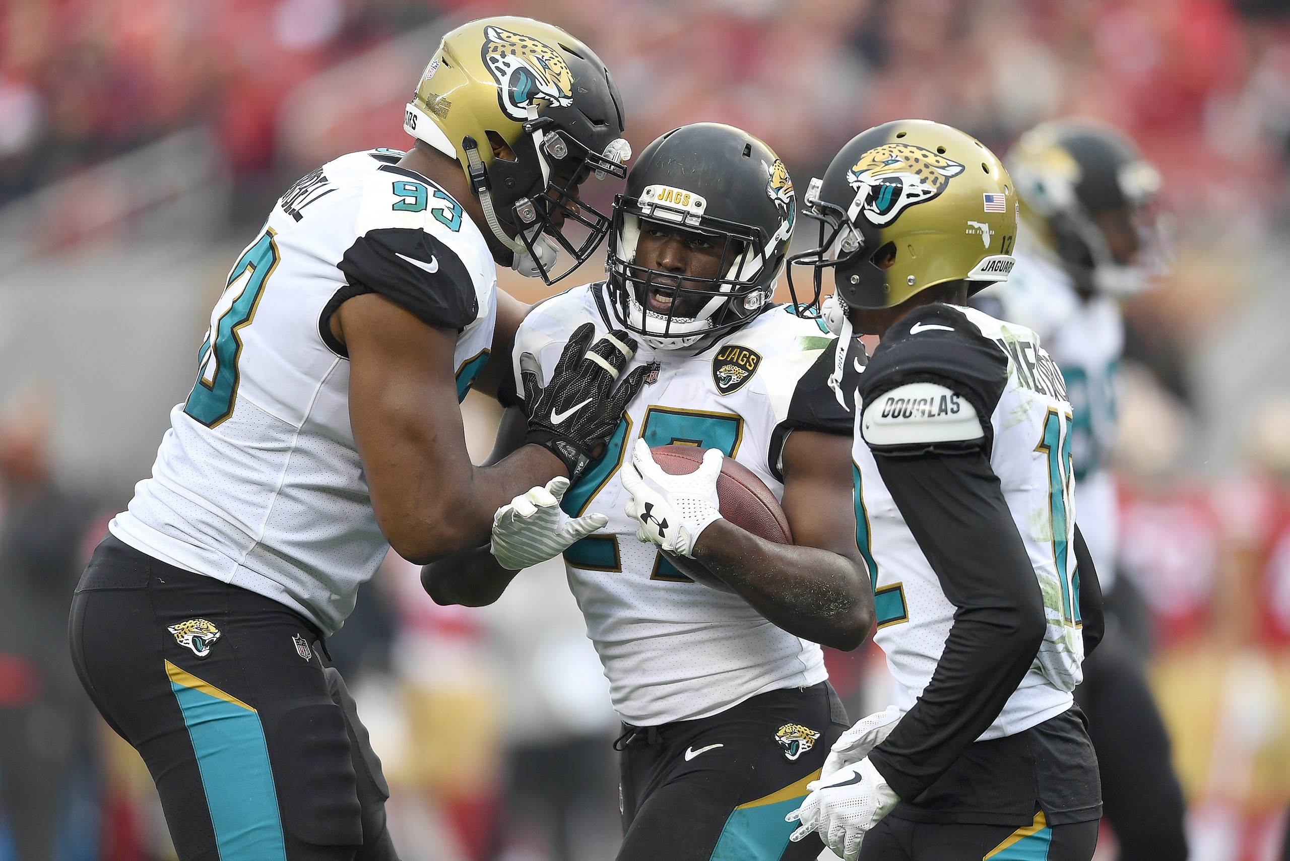 SANTA CLARA, CA - DECEMBER 24: Leonard Fournette #27 of the Jacksonville Jaguars is congratulated by Calais Campbell #93 after Fournette scored a touchdown against the San Francisco 49ers during their NFL football game at Levi's Stadium on December 24, 2 SANTA CLARA, CA - DECEMBER 24: Leonard Fournette #27 of the Jacksonville Jaguars is congratulated by Calais Campbell #93 after Fournette scored a touchdown against the San Francisco 49ers during their NFL football game at Levi's Stadium on December 24, 2