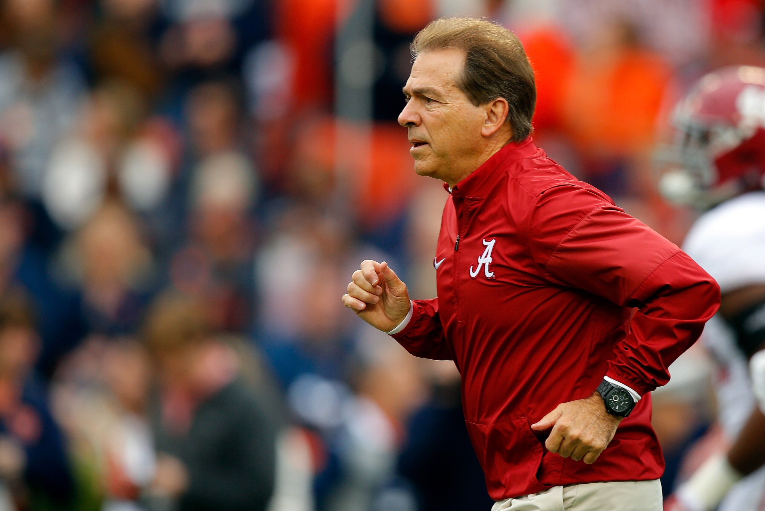 AUBURN, AL - NOVEMBER 25:  Head coach Nick Saban of the Alabama Crimson Tide leads his team in warm ups prior to the game against the Auburn Tigers at Jordan Hare Stadium on November 25, 2017 in Auburn, Alabama.  (Photo by Kevin C. Cox/Getty Images)