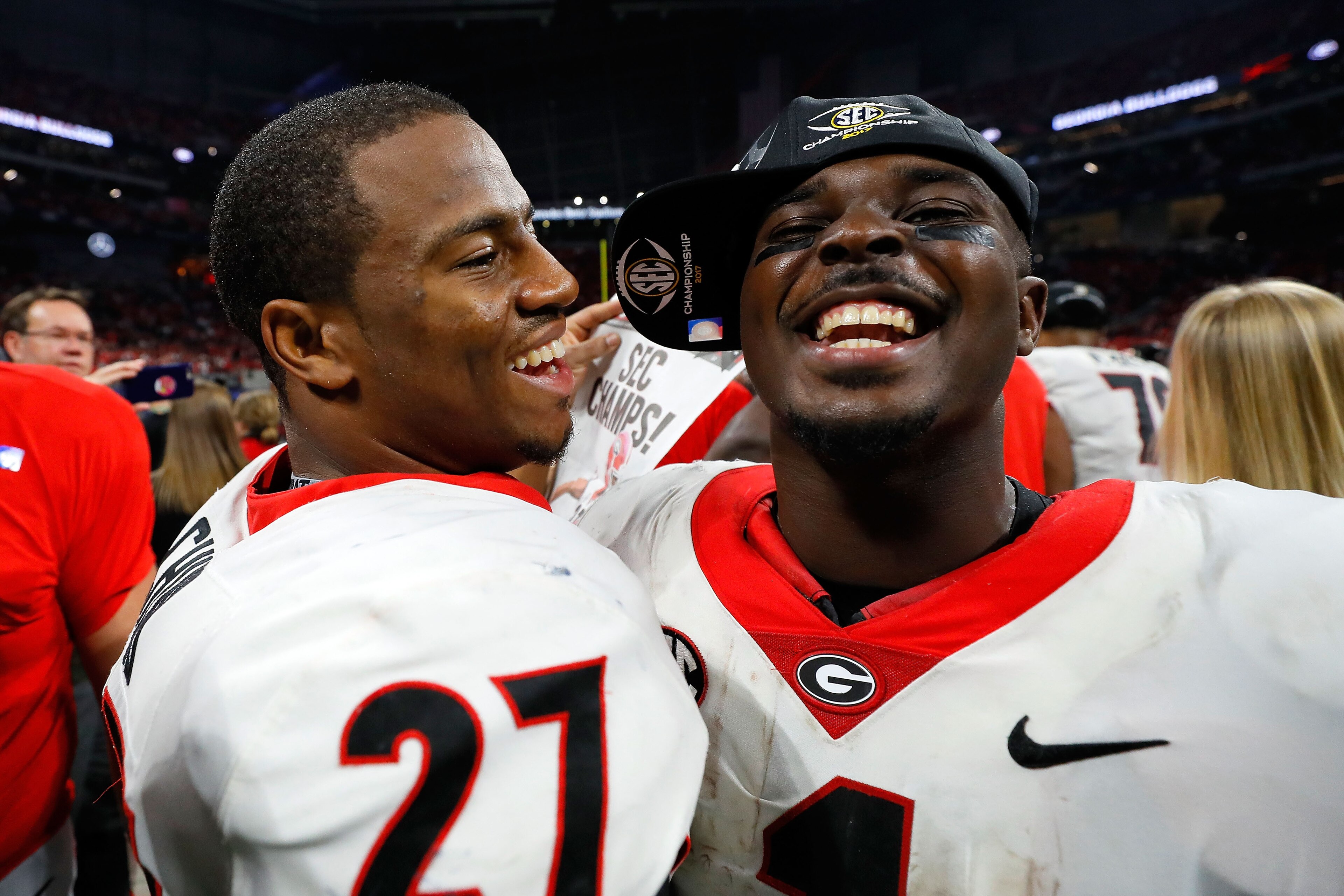 ATLANTA, GA - DECEMBER 02: Nick Chubb #27 and Sony Michel #1 celebrate beating the Auburn Tigers in the SEC Championship at Mercedes-Benz Stadium on December 2, 2017 in Atlanta, Georgia. (Photo by Kevin C.  Cox/Getty Images)