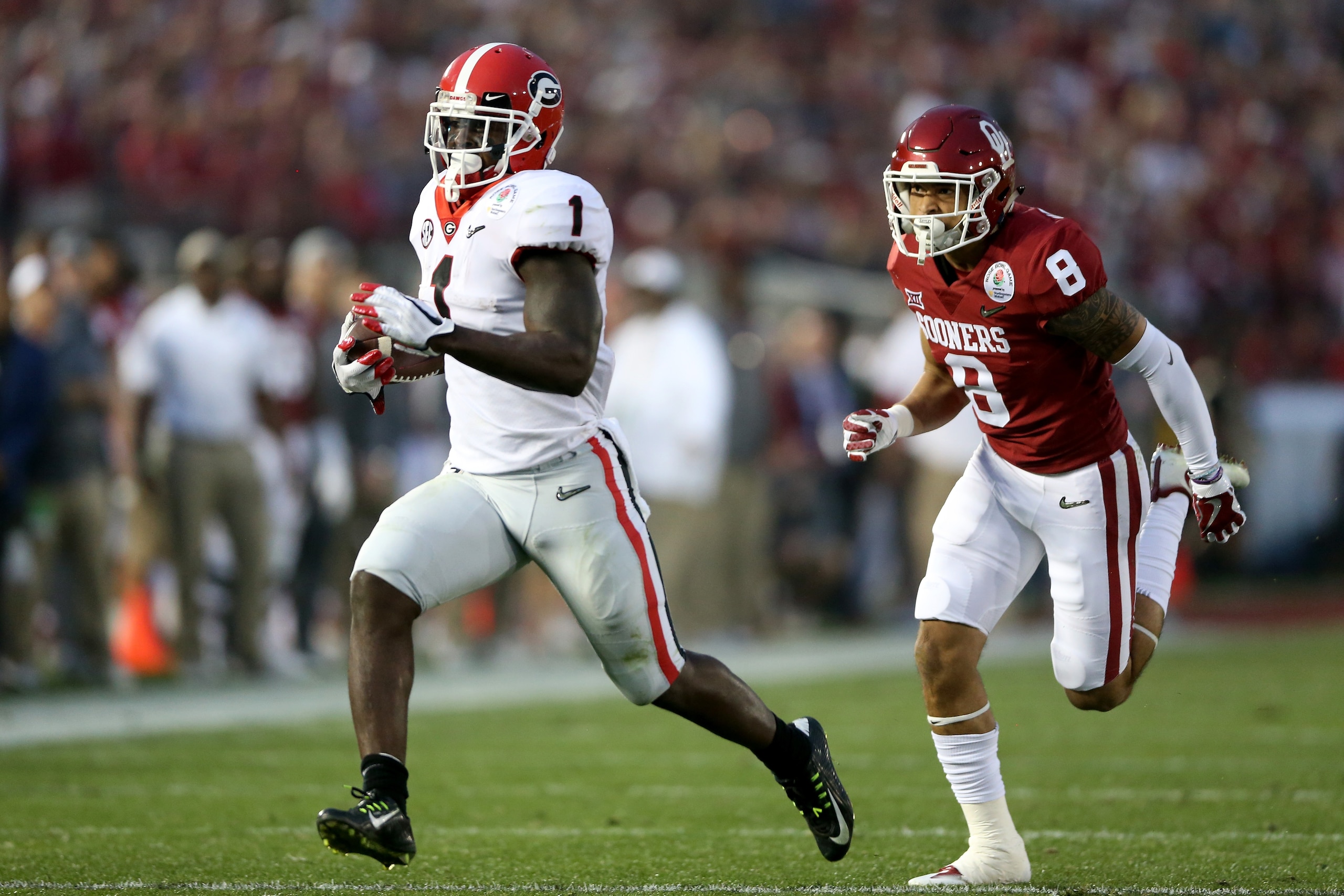 PASADENA, CA - JANUARY 01: Sony Michel #1 of the Georgia Bulldogs runs to the end zone for a touchdown tying the game 31-31 in the 2018 College Football Playoff Semifinal Game at the Rose Bowl Game presented by Northwestern Mutual at the Rose Bowl on Jan PASADENA, CA - JANUARY 01: Sony Michel #1 of the Georgia Bulldogs runs to the end zone for a touchdown tying the game 31-31 in the 2018 College Football Playoff Semifinal Game at the Rose Bowl Game presented by Northwestern Mutual at the Rose Bowl on Jan