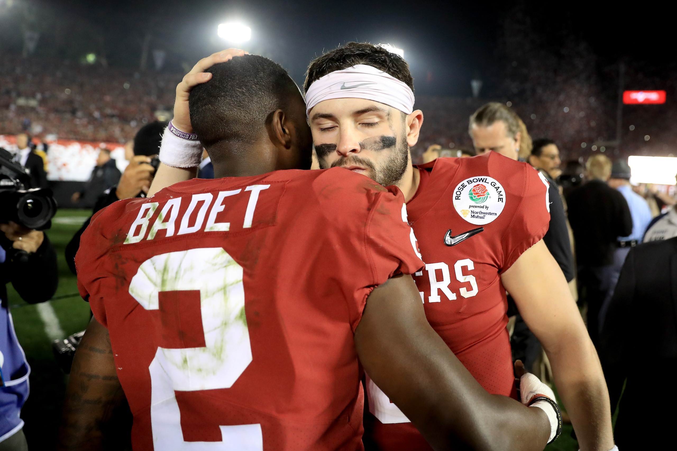 PASADENA, CA - JANUARY 01:  Baker Mayfield #6 of the Oklahoma Sooners and Marquise Brown #5 of the Oklahoma Sooners hug after playing in the 2018 College Football Playoff Semifinal Game against the Georgia Bulldogs at the Rose Bowl Game presented by North