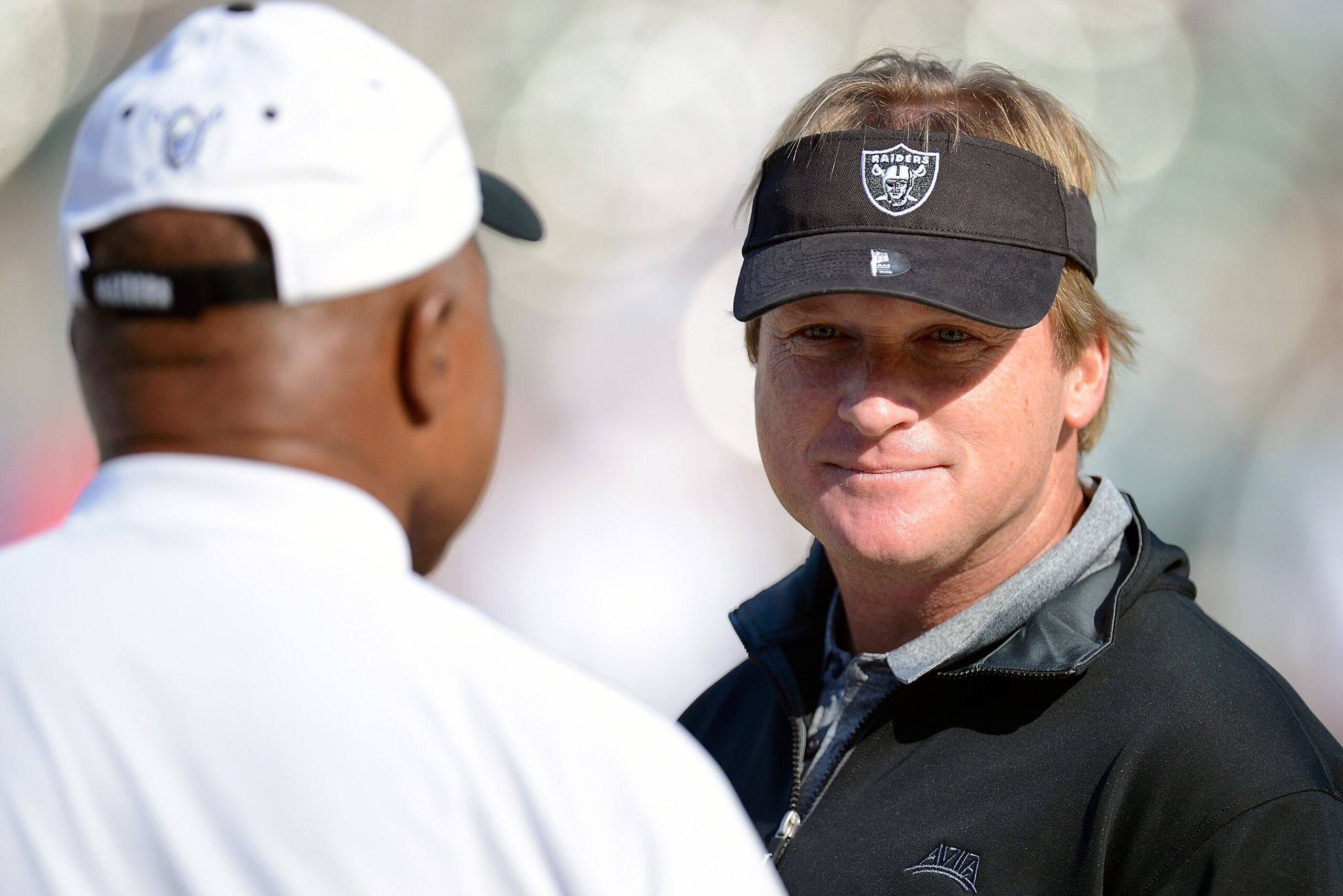 OAKLAND, CA - NOVEMBER 18:  Former head coach of the Oakland Raiders and now ESPN Monday Night Football Analyst Jon Gruden looks on during pre-game warm ups before an NFL football game between the New Orleans Saints and Oakland Raiders at O.co Coliseum on