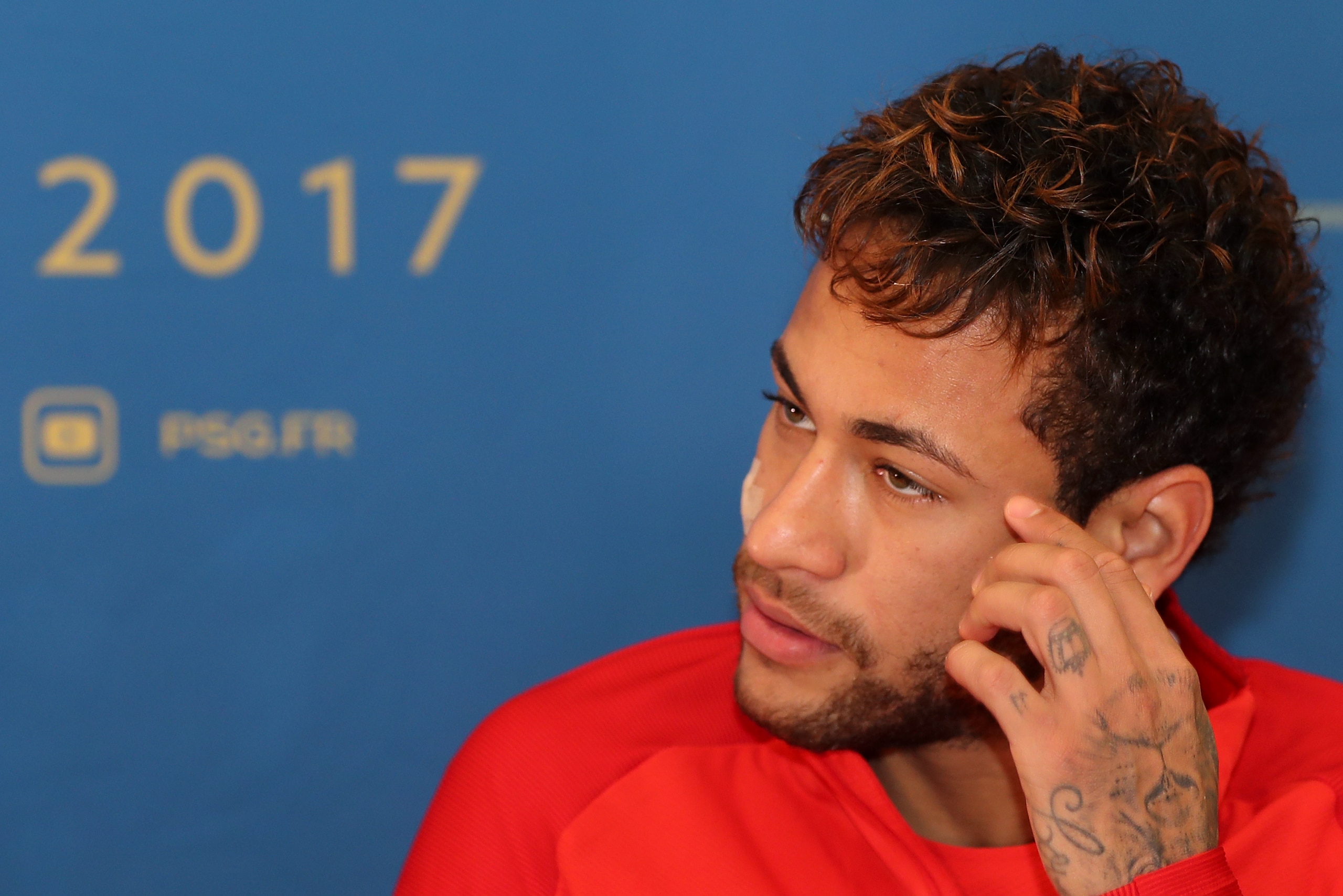 Paris Saint-Germain's Brazilian forward Neymar holds a press conference in Doha on December 21, 2017, during a winter training camp in Qatar. / AFP PHOTO / KARIM JAAFAR (Photo credit should read KARIM JAAFAR/AFP/Getty Images) Paris Saint-Germain's Brazilian forward Neymar holds a press conference in Doha on December 21, 2017, during a winter training camp in Qatar. / AFP PHOTO / KARIM JAAFAR (Photo credit should read KARIM JAAFAR/AFP/Getty Images)