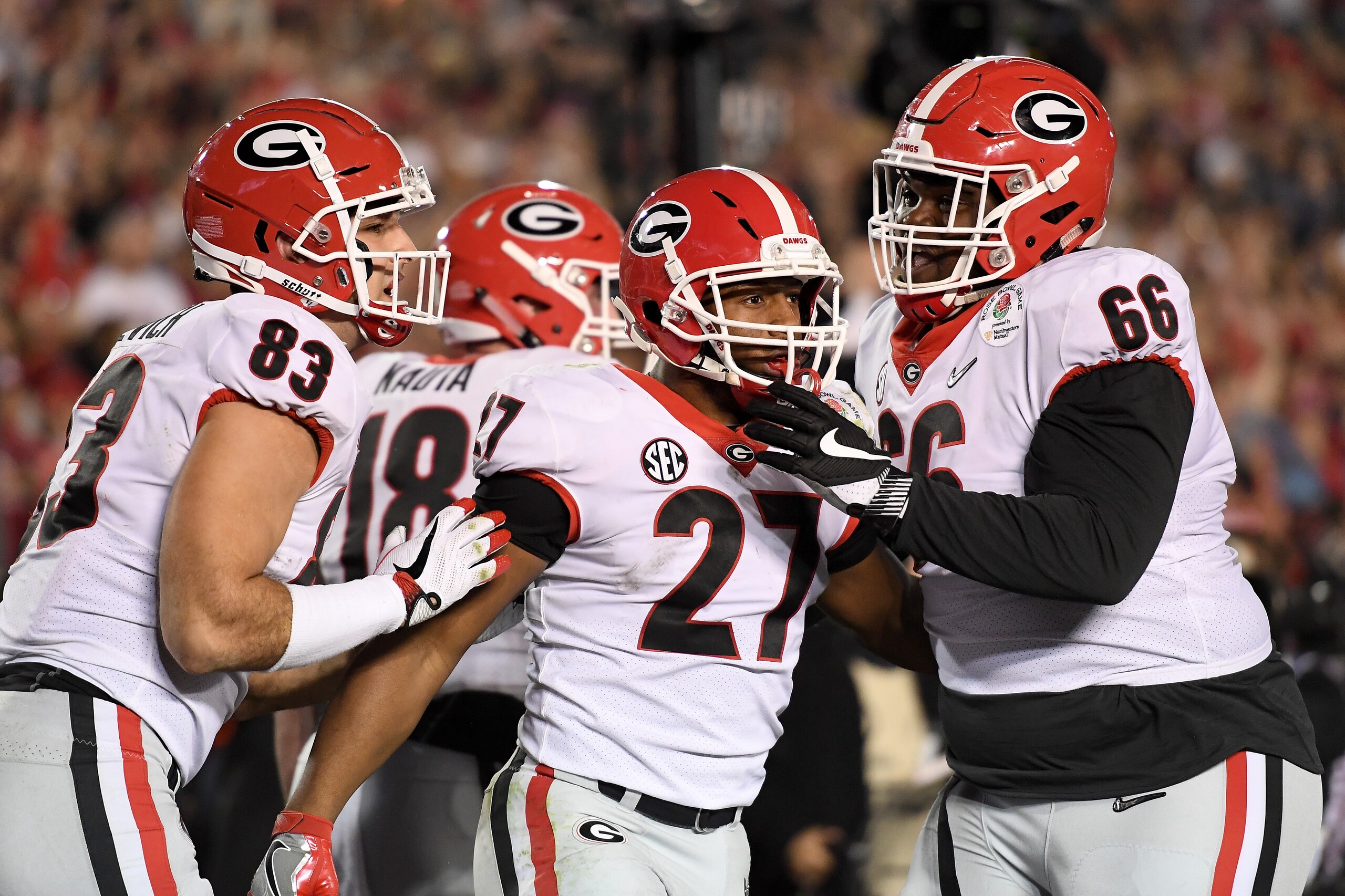 PASADENA, CA - JANUARY 01:  Nick Chubb #27 of the Georgia Bulldogs, Jeb Blazevich #83, and Solomon Kindley #66 celebrate  after Chubb scores a touchdown in the final minutes of the game 2018 College Football Playoff Semifinal Game against the Oklahoma Soo