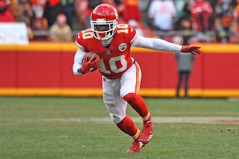 KANSAS CITY, MO - DECEMBER 24:  Wide receiver Tyreek Hill #10 of the Kansas City Chiefs runs up field after catching a pass against the Miami Dolphins during the second half of the game at Arrowhead Stadium on December 24, 2017 in Kansas City, Missouri. (