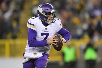 GREEN BAY, WI - DECEMBER 23:  Case Keenum #7 of the Minnesota Vikings drops back to pass during a game against the Green Bay Packers at Lambeau Field on December 23, 2017 in Green Bay, Wisconsin.  The Vikings defeated the Packers 16-0.  (Photo by Stacy Re