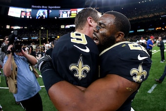 NEW ORLEANS, LA - NOVEMBER 19:  Drew Brees #9 of the New Orleans Saints and Mark Ingram #22 of the New Orleans Saints celebrate after defeating the Washington Redskins during a NFL game at the Mercedes-Benz Superdome on November 19, 2017 in New Orleans, L