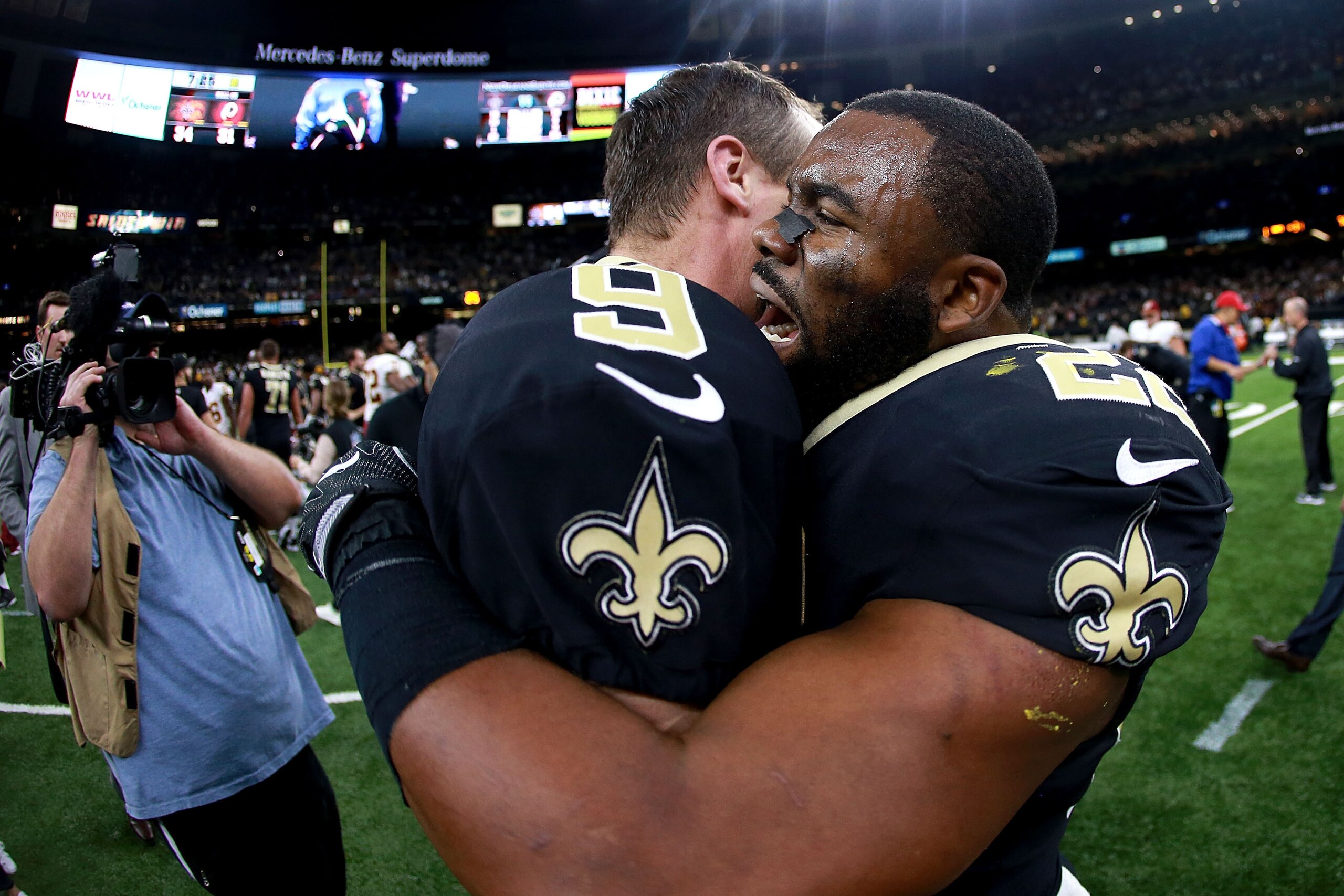 NEW ORLEANS, LA - NOVEMBER 19:  Drew Brees #9 of the New Orleans Saints and Mark Ingram #22 of the New Orleans Saints celebrate after defeating the Washington Redskins during a NFL game at the Mercedes-Benz Superdome on November 19, 2017 in New Orleans, L