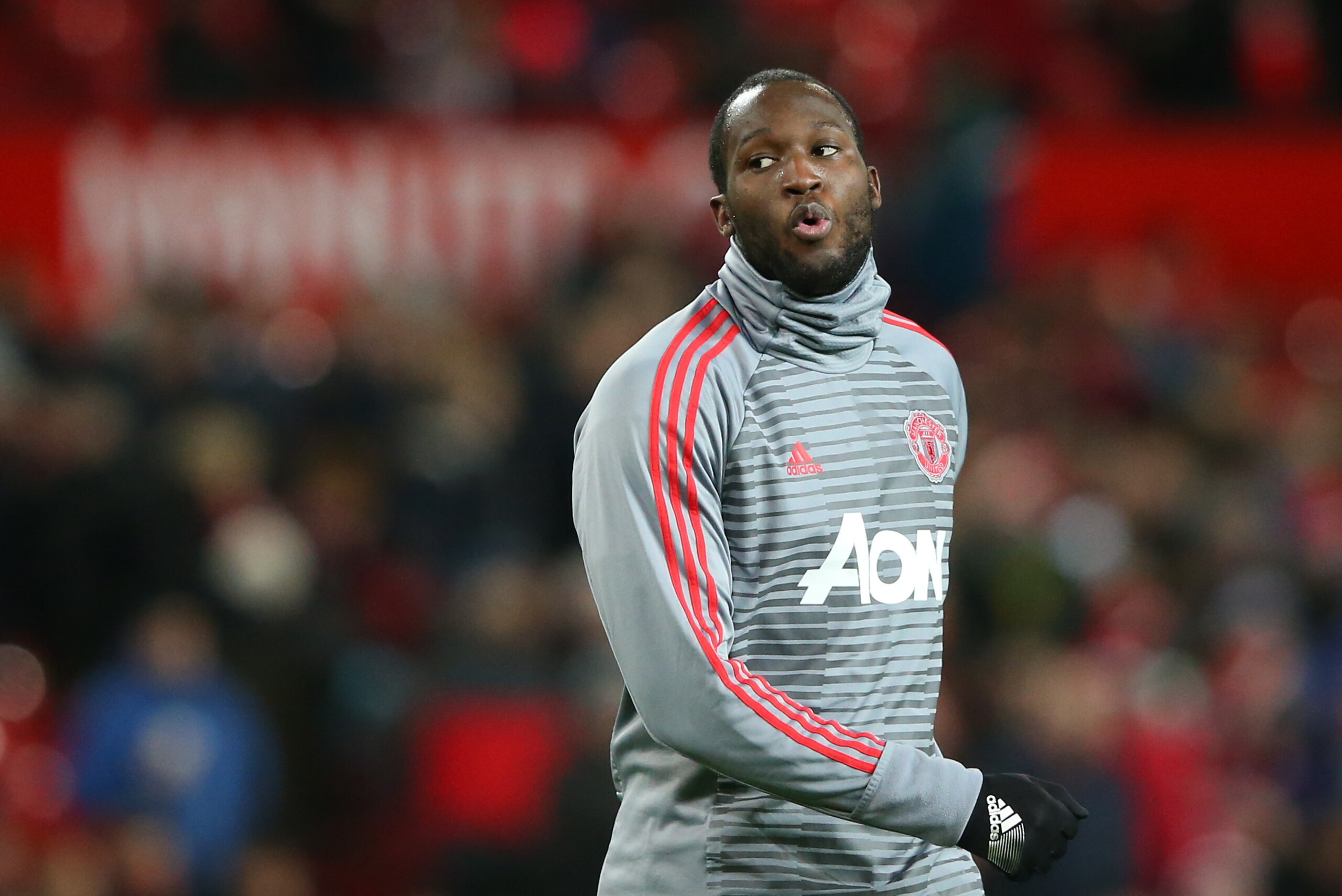 MANCHESTER, ENGLAND - DECEMBER 30:  Romelu Lukaku of Manchester United looks on during his warm up prior to the Premier League match between Manchester United and Southampton at Old Trafford on December 30, 2017 in Manchester, England.  (Photo by Alex Liv