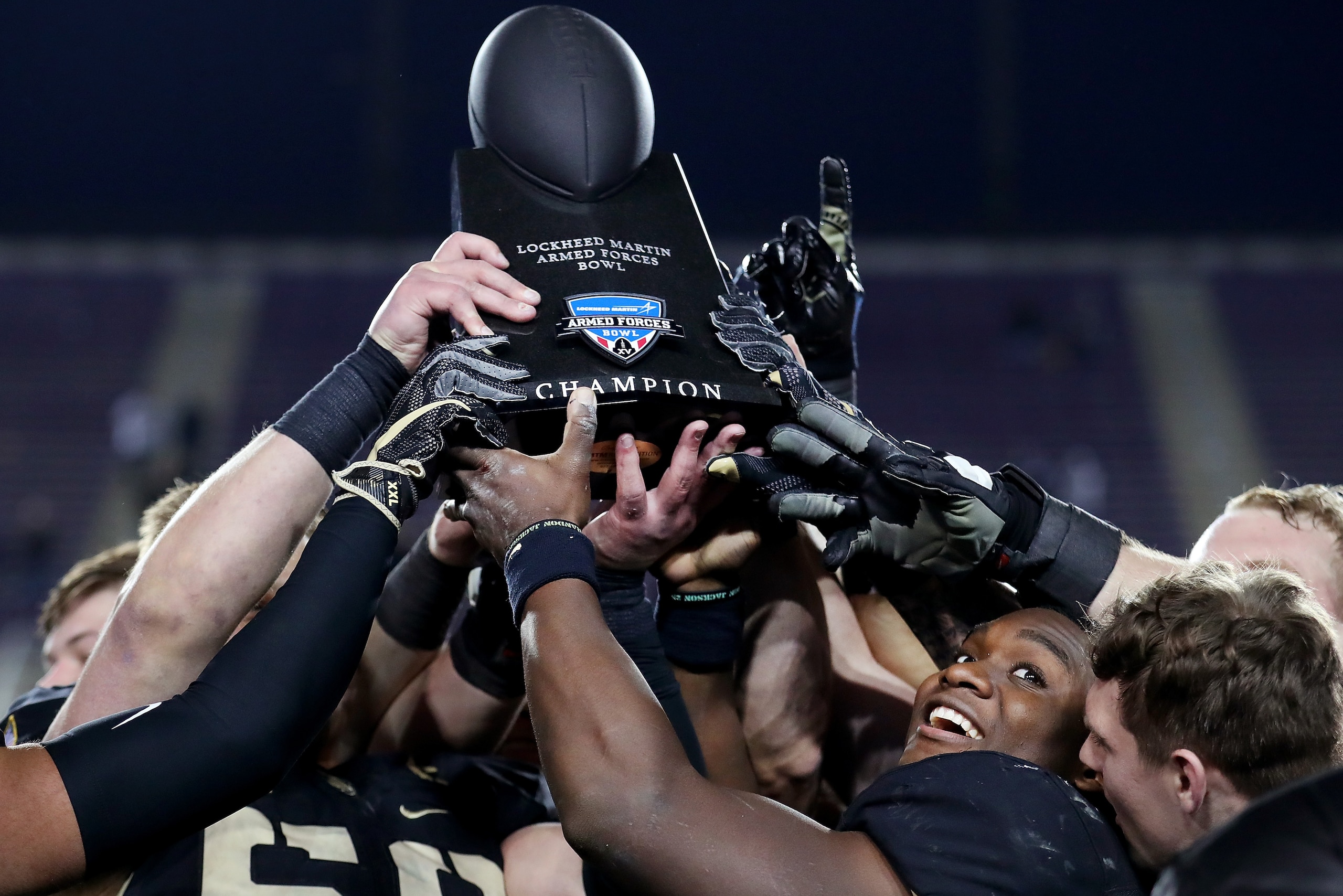 FORT WORTH, TX - DECEMBER 23:  Ahmad Bradshaw #17 of the Army Black Knights celebrates after the Army Black Knights beat the San Diego State Aztecs 42-35 in the Lockheed Martin Armed Forces Bowl at Amon G. Carter Stadium on December 23, 2017 in Fort Worth