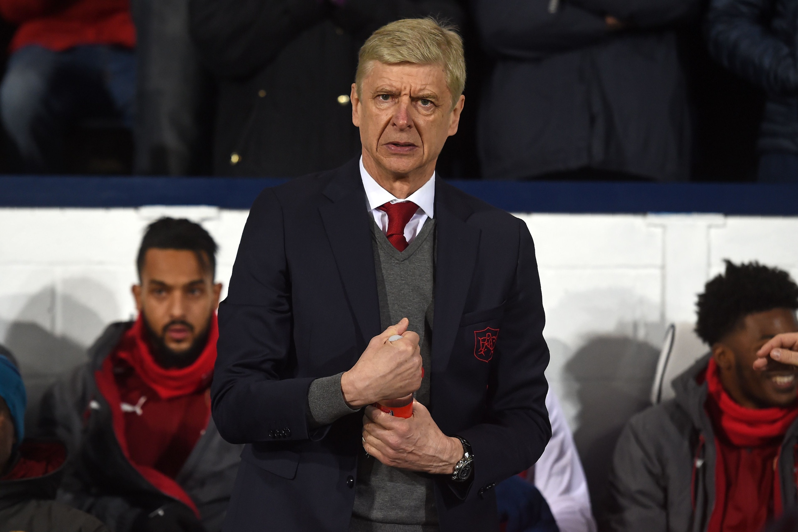 Arsenal's French manager Arsene Wenger awaits kick off in the English Premier League football match between West Bromwich Albion and Arsenal at The Hawthorns stadium in West Bromwich, central England, on December 31, 2017.
 / AFP PHOTO / PAUL ELLIS / REST