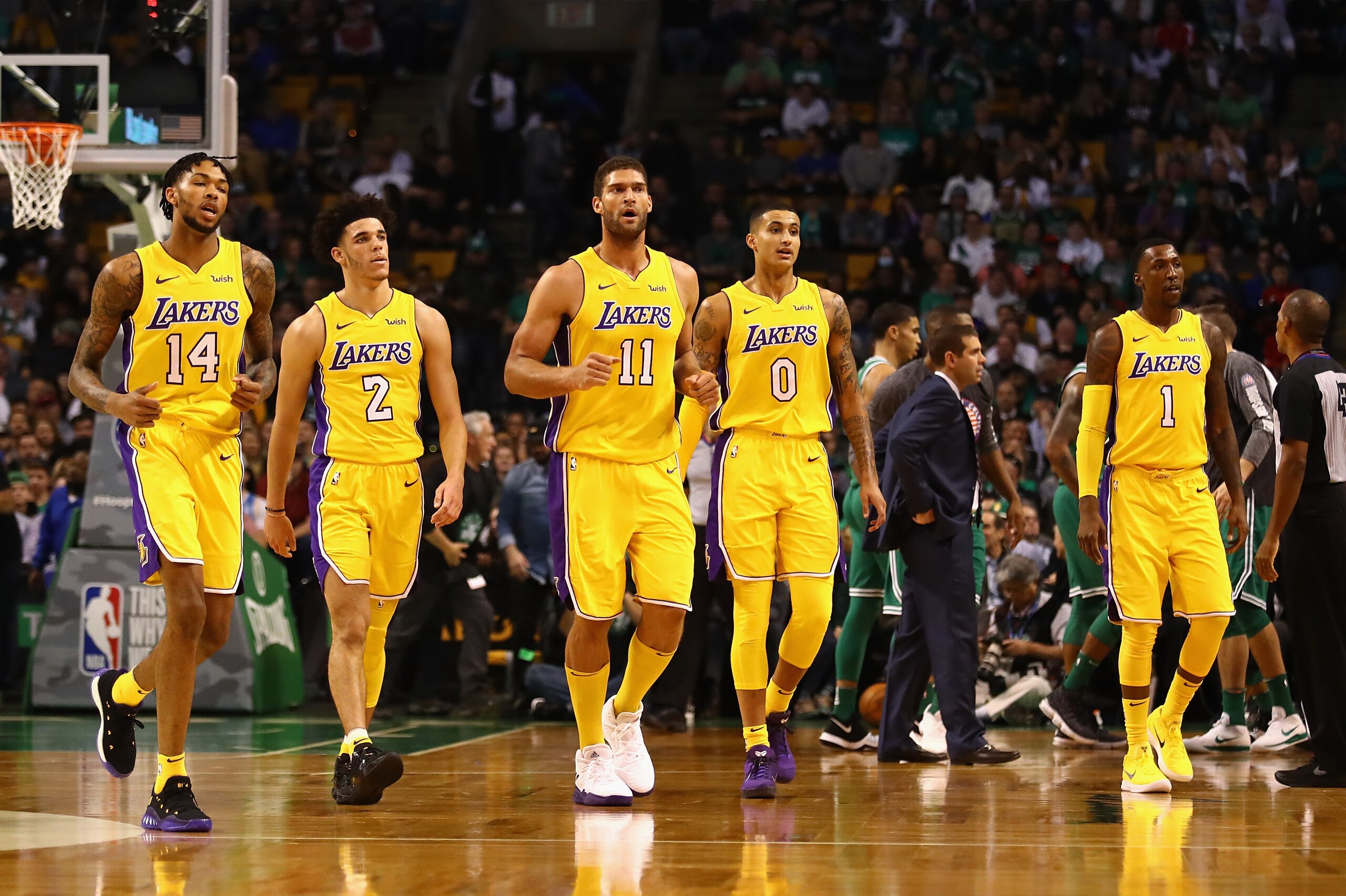 BOSTON, MA - NOVEMBER 08:  (L-R) Brandon Ingram #14, Lonzo Ball #2, Brook Lopez #11, Kyle Kuzma #0, and Kentavious Caldwell-Pope #1 of the Los Angeles Lakers walk to the bench during a time out in the first quarter against the Boston Celtics at TD Garden 