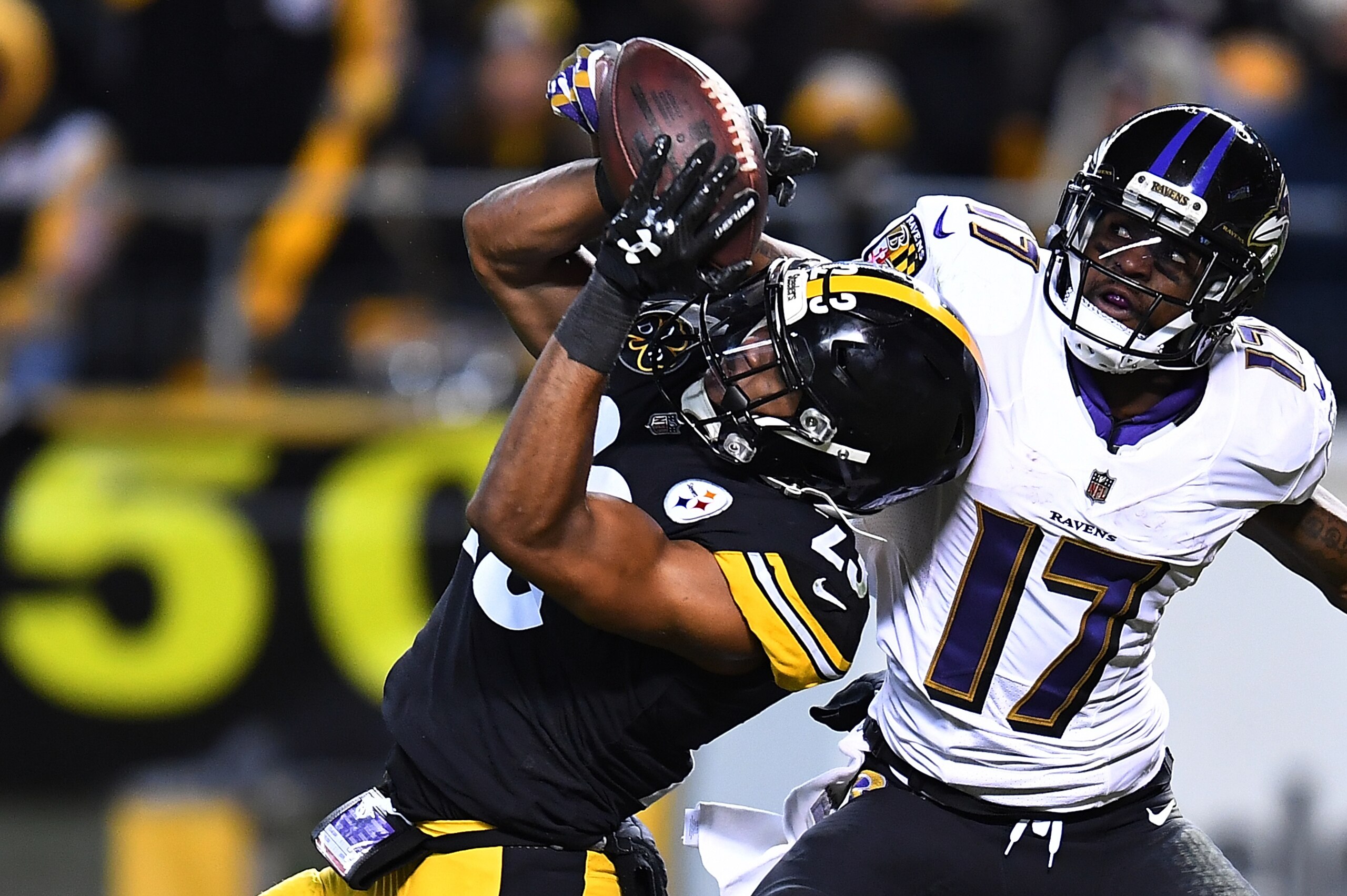 PITTSBURGH, PA - DECEMBER 10: Mike Mitchell #23 of the Pittsburgh Steelers breaks up a pass intended for Mike Wallace #17 of the Baltimore Ravens in the second half during the game at Heinz Field on December 10, 2017 in Pittsburgh, Pennsylvania. (Photo by