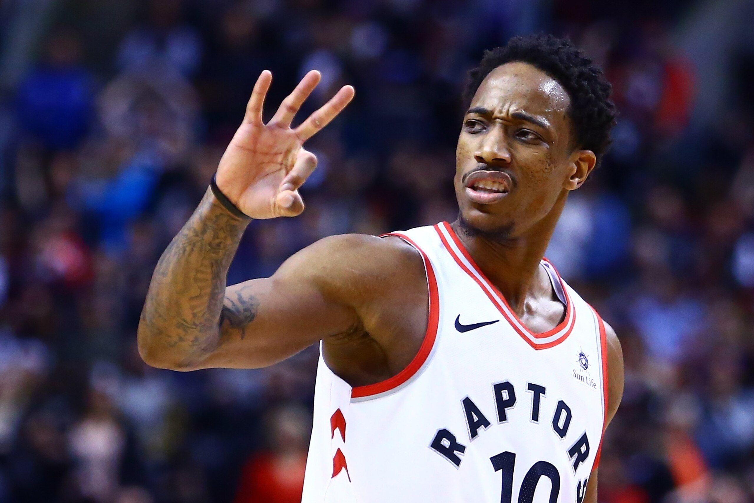 TORONTO, ON - JANUARY 01:  DeMar DeRozan #10 of the Toronto Raptors signals to an official during the second half of an NBA game against the Milwaukee Bucks at Air Canada Centre on January 1, 2018 in Toronto, Canada.  NOTE TO USER: User expressly acknowle
