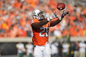 STILLWATER, OK - OCTOBER 14: Wide receiver James Washington #28 of the Oklahoma State Cowboys makes a reception against the Baylor Bears at Boone Pickens Stadium on October 14, 2017 in Stillwater, Oklahoma. Oklahoma State defeated Baylor 59-16. (Photo by 