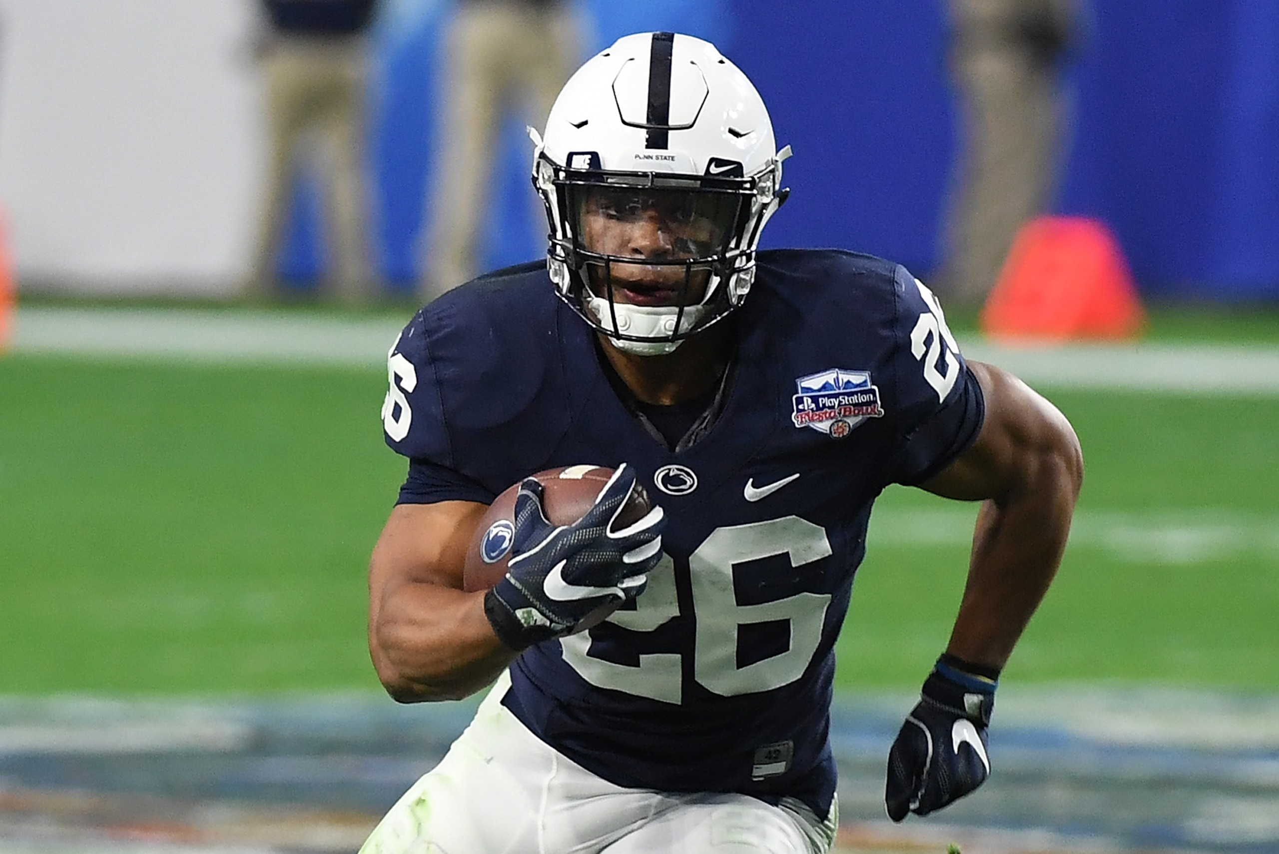 GLENDALE, AZ - DECEMBER 30:  Saquon Barkley #26 of Penn State Nittany Lions runs with the ball against the Washington Huskies during the Playstation Fiesta Bowl at University of Phoenix Stadium on December 30, 2017 in Glendale, Arizona.  (Photo by Norm Ha