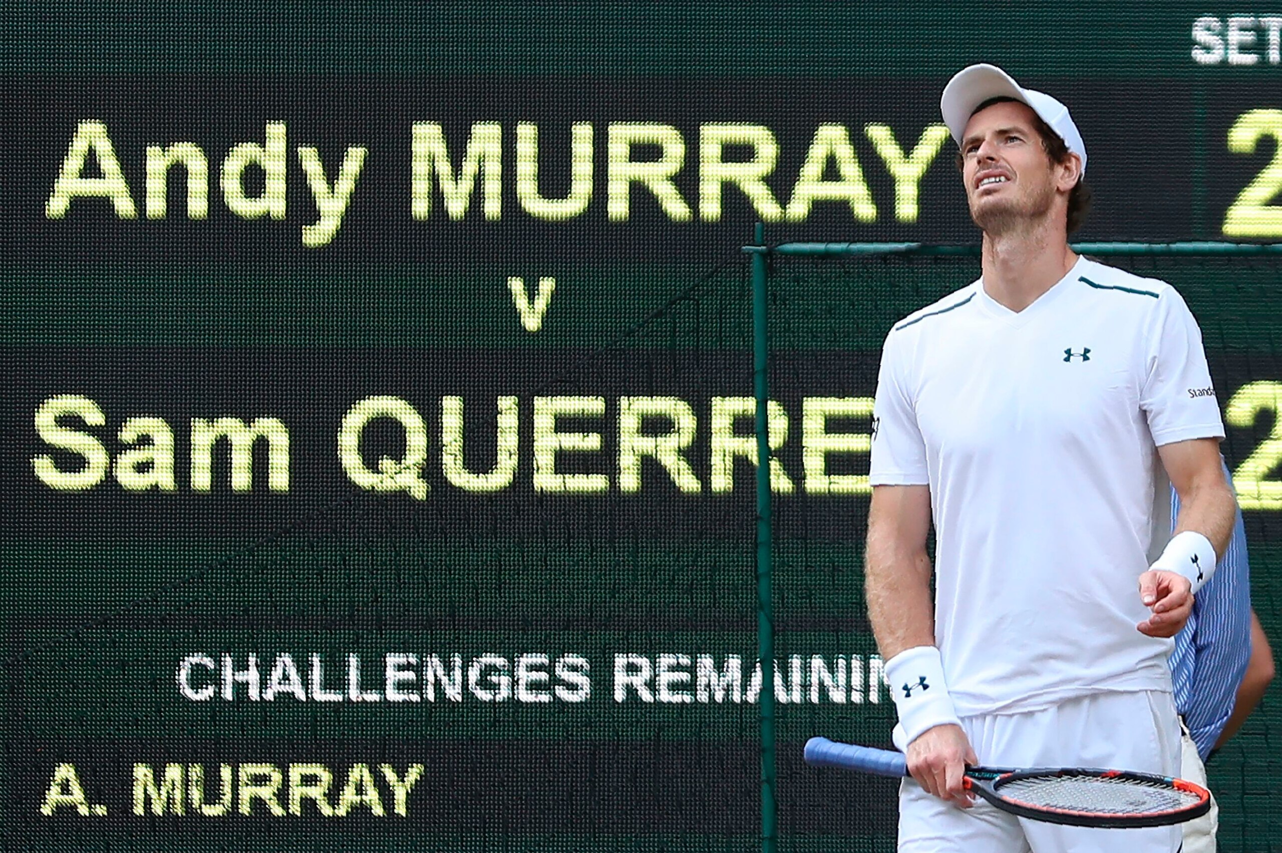 Britain's Andy Murray reacts after a point against US player Sam Querrey during their men's singles quarter-final match on the ninth day of the 2017 Wimbledon Championships at The All England Lawn Tennis Club in Wimbledon, southwest London, on July 12, 20