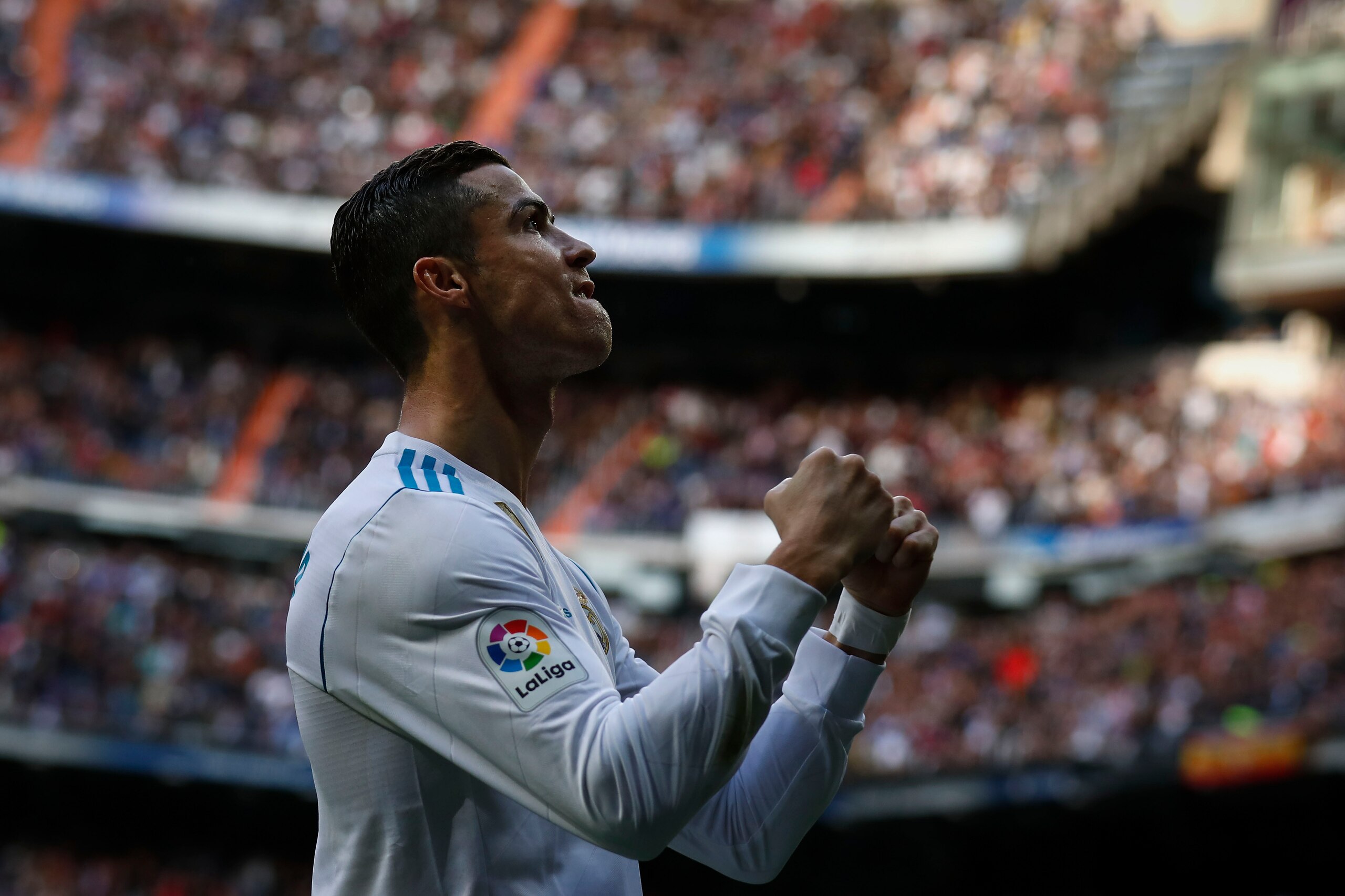 MADRID, SPAIN - DECEMBER 09: Cristiano Ronaldo of Real Madrid CF celebrates scoring their second goal during the La Liga match between Real Madrid CF and Sevilla FC at Estadio Santiago Bernabeu on December 9, 2017 in Madrid, Spain . (Photo by Gonzalo Arro