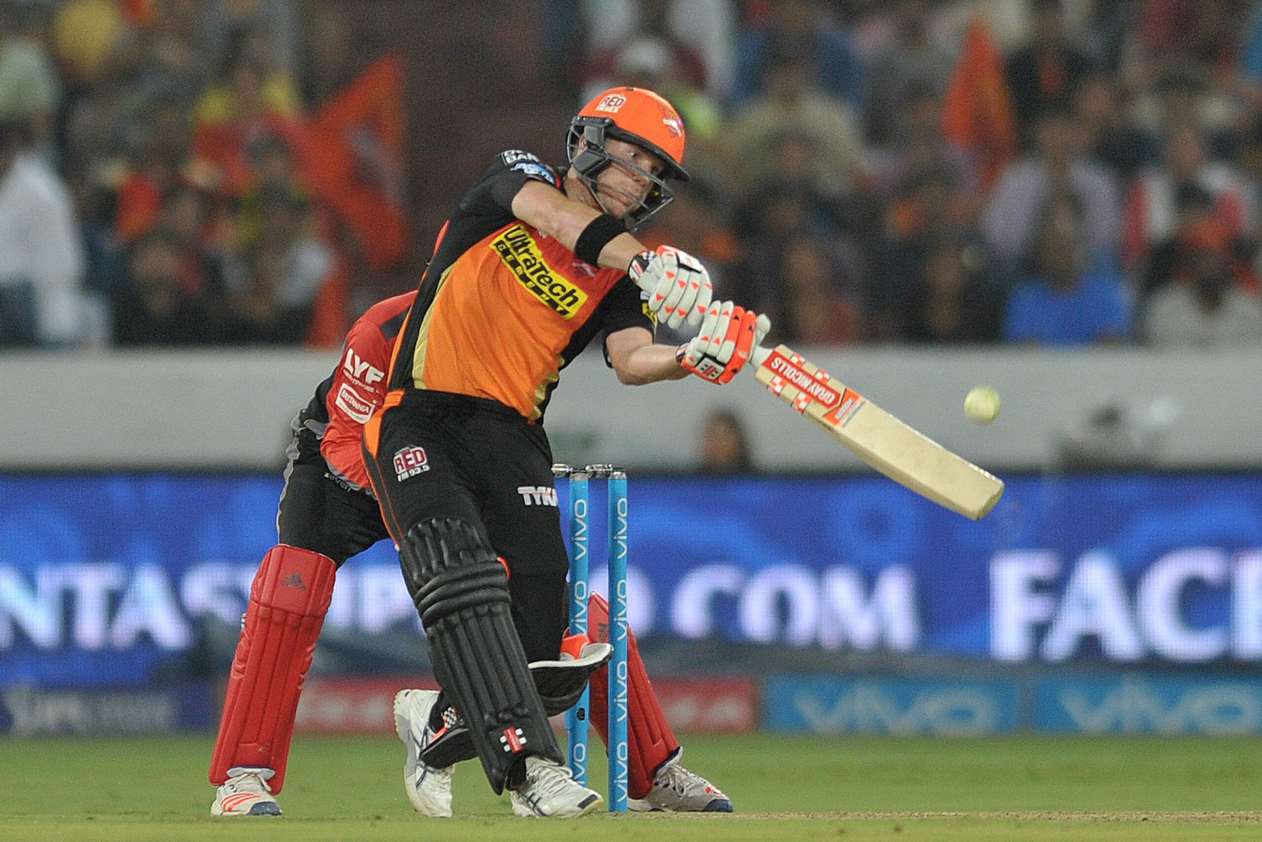 Sunrisers Hyderabad captain David Warner plays a shot during the 2016 Indian Premier League (IPL) Twenty20 cricket match between Sunrisers Hyderabad and Royal Challengers Bangalore at The Rajiv Gandhi International Stadium in Hyderabad  on April 30, 2016.
