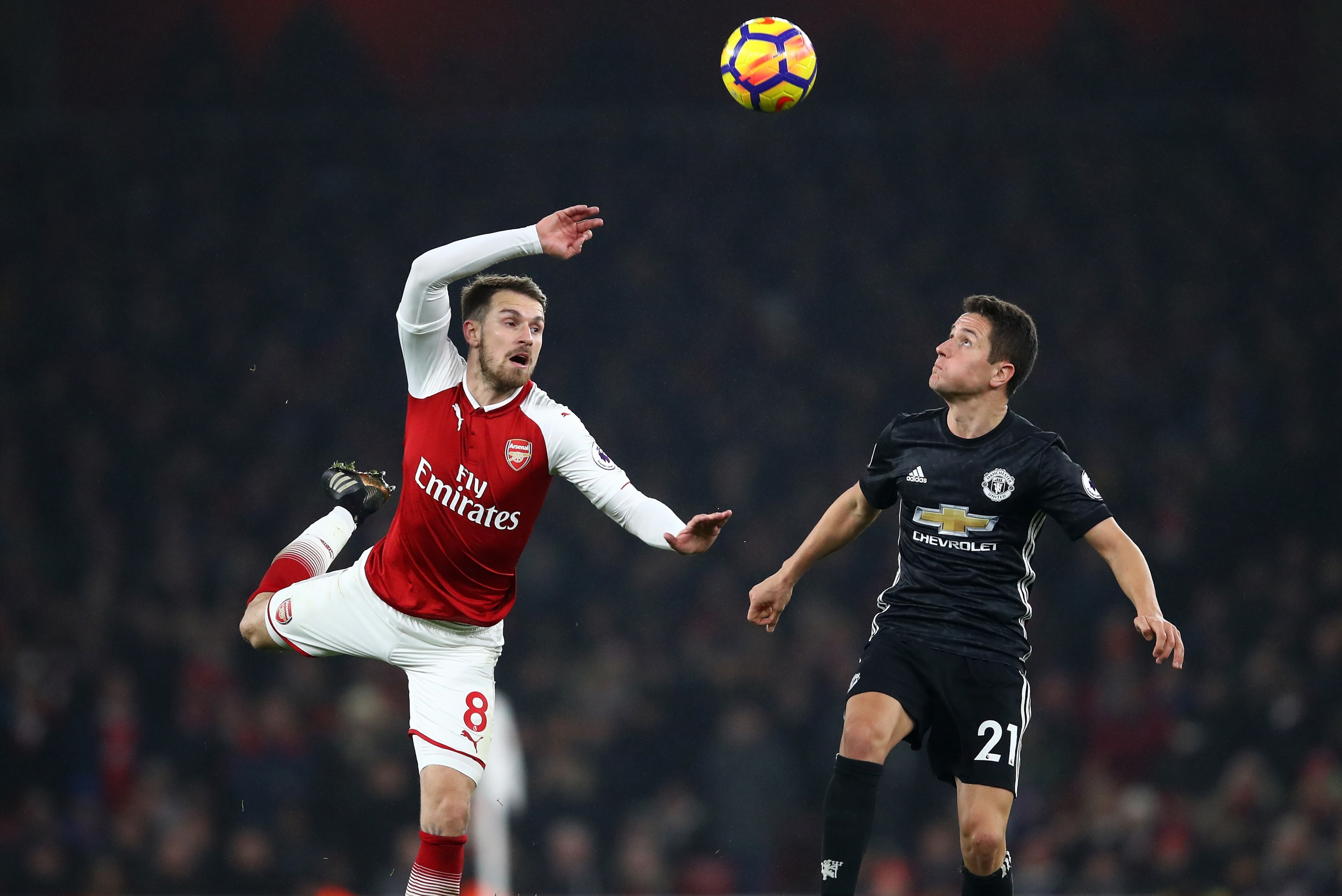 LONDON, ENGLAND - DECEMBER 02:  Aaron Ramsey of Arsenal in action with Ander Herrera of Manchester United during the Premier League match between Arsenal and Manchester United at Emirates Stadium on December 2, 2017 in London, England.  (Photo by Julian F