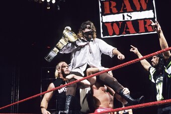 Mick Foley celebrates his first WWF Championship win.