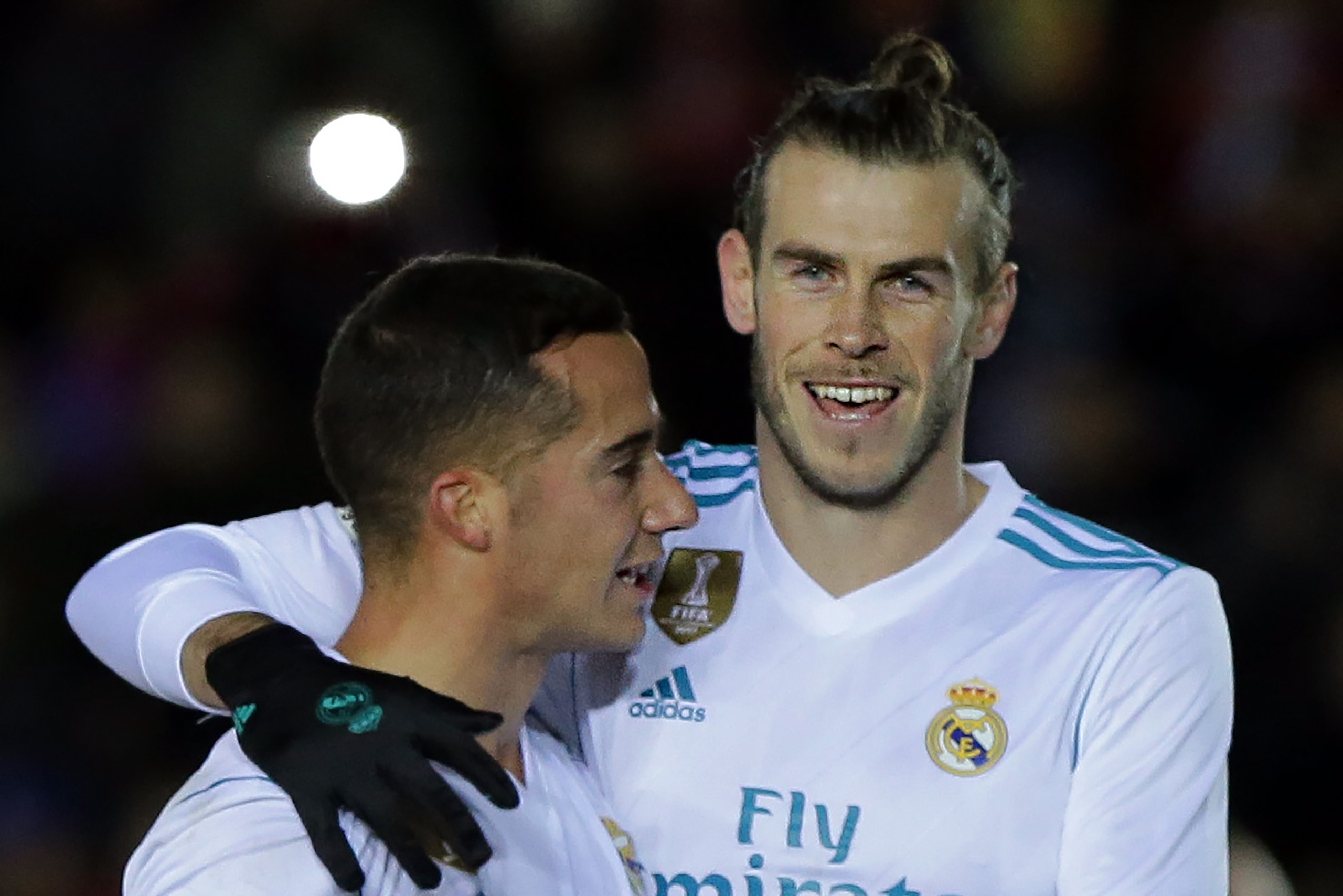 Real Madrid's Welsh forward Gareth Bale (R) celebrates a goal with Real Madrid's Spanish midfielder Lucas Vazquez during the Spanish Copa del Rey (King's Cup) round of 16 first leg football match CD Numancia vs Real Madrid CF at Nuevo Estadio Los Pajarito