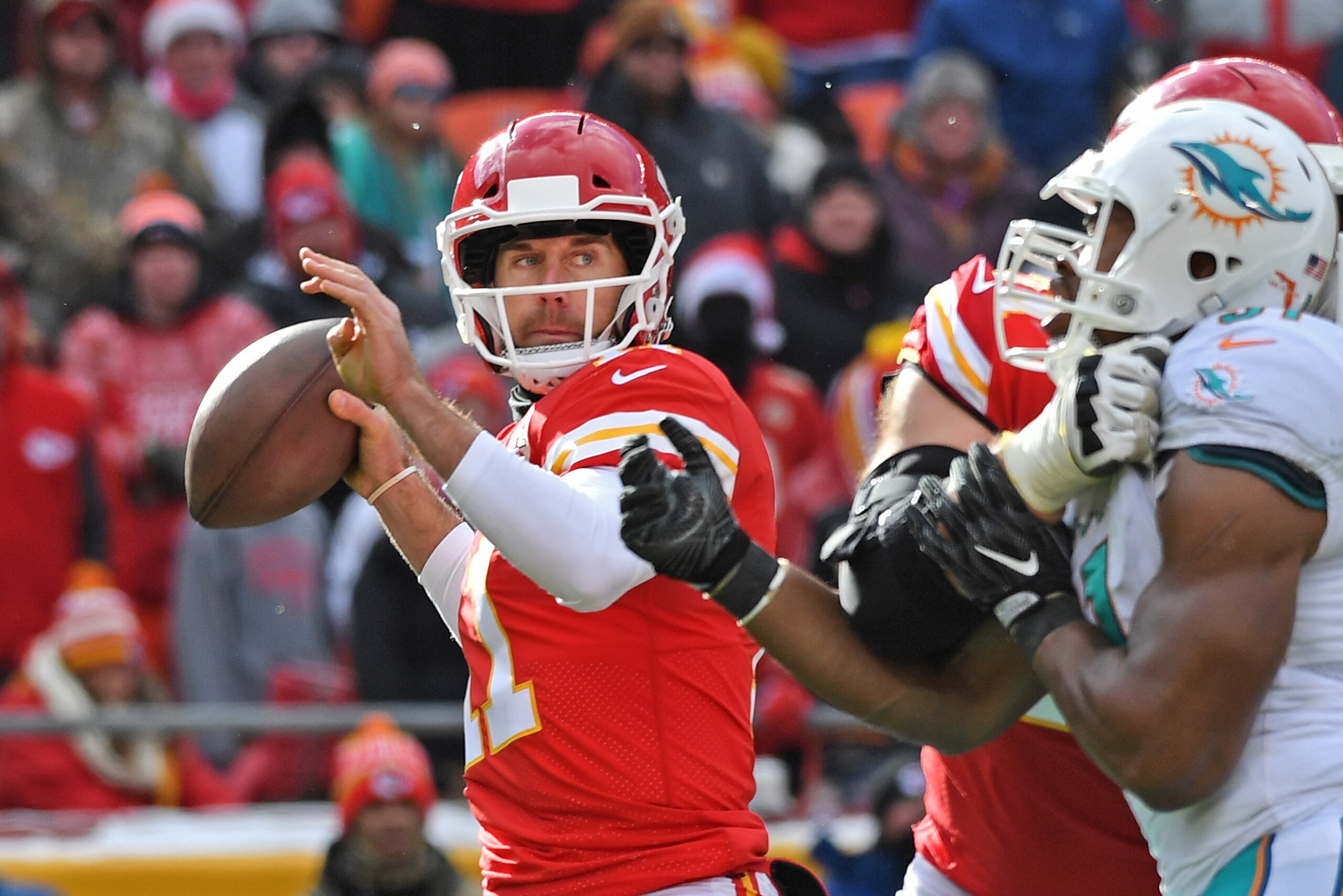 KANSAS CITY, MO - DECEMBER 24: Quarterback Alex Smith #11 of the Kansas City Chiefs throws a pass against the Miami Dolphins during the first half of the game at Arrowhead Stadium on December 24, 2017 in Kansas City, Missouri. ( Photo by Peter G. Aiken/G KANSAS CITY, MO - DECEMBER 24: Quarterback Alex Smith #11 of the Kansas City Chiefs throws a pass against the Miami Dolphins during the first half of the game at Arrowhead Stadium on December 24, 2017 in Kansas City, Missouri. ( Photo by Peter G. Aiken/G
