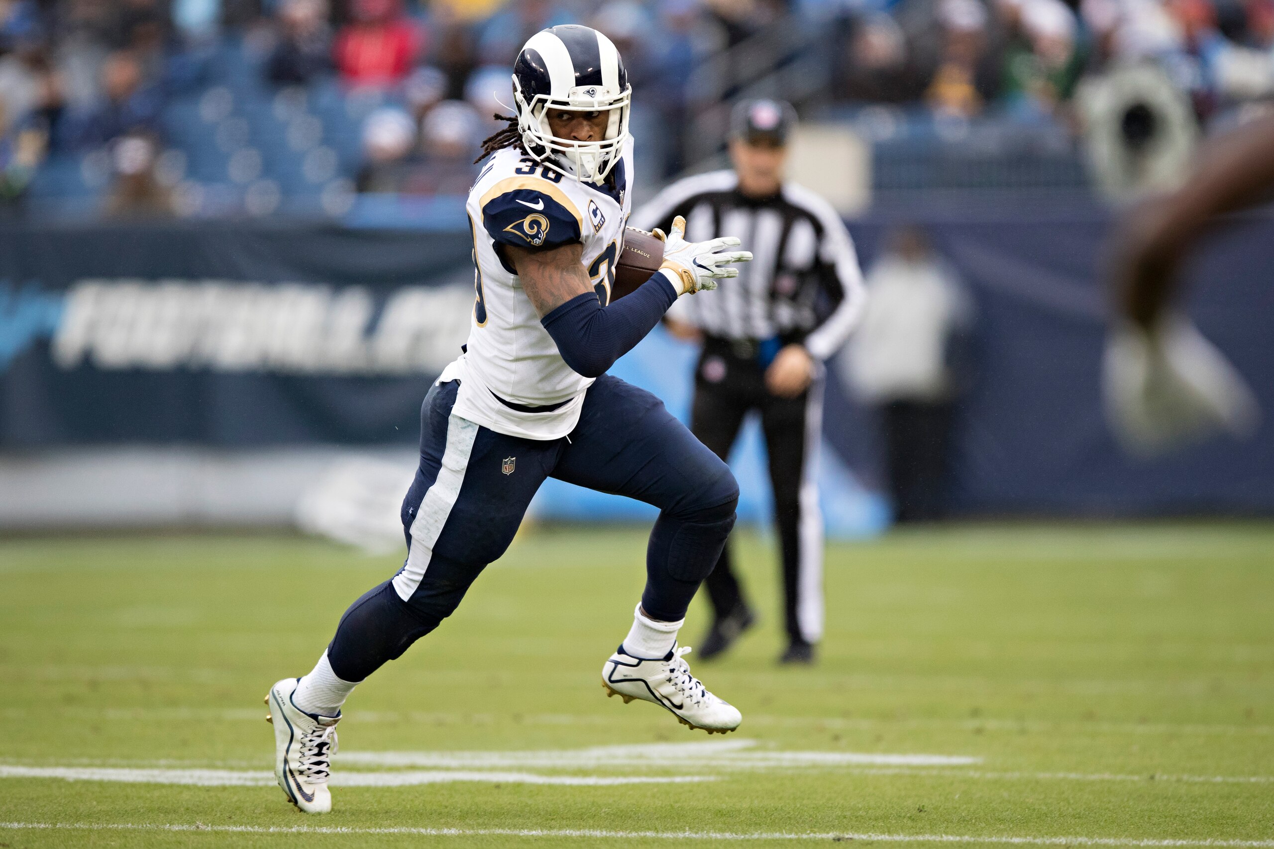 NASHVILLE, TN - DECEMBER 24:  Todd Gurley II #30 of the Los Angeles Rams runs the ball during a game against the Tennessee Titans at Nissan Stadium on December 24, 2017 in Nashville, Tennessee.  The Rams defeated the Titans 27-23.  (Photo by Wesley Hitt/G