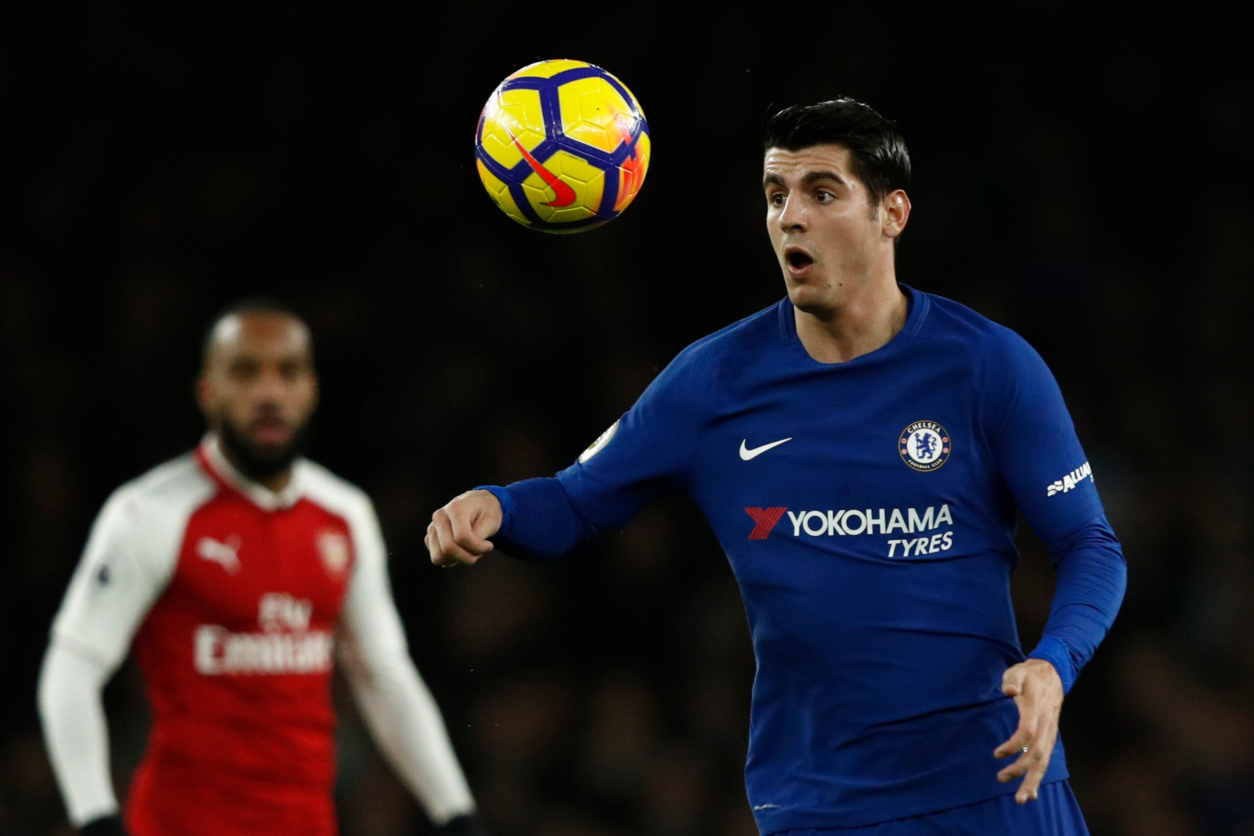 Chelsea's Spanish striker Alvaro Morata eyes the ball during the English Premier League football match between Arsenal and Chelsea at the Emirates Stadium in London on January 3, 2018.  / AFP PHOTO / Adrian DENNIS / RESTRICTED TO EDITORIAL USE. No use wit